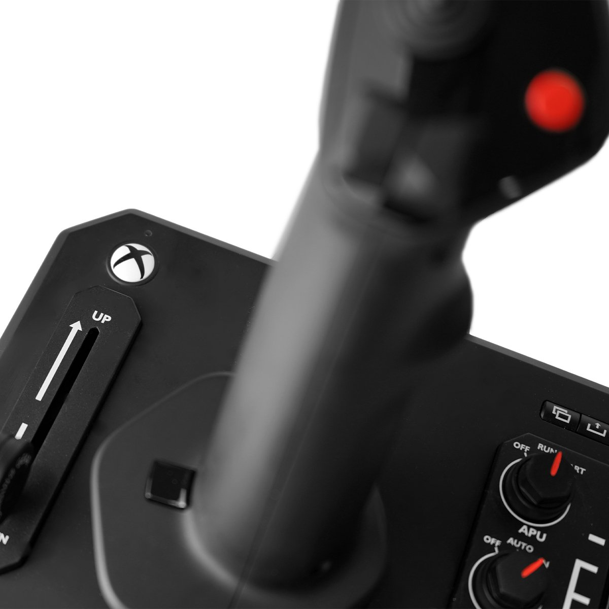 A black joystick with an Xbox logo, sliders, and rotary knobs.