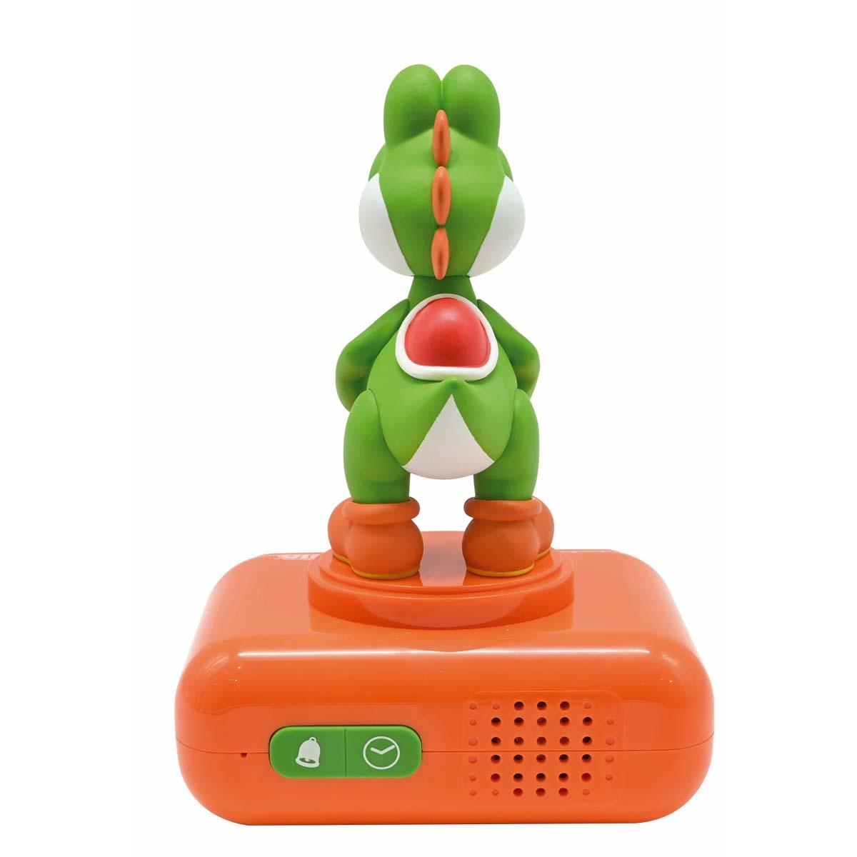 Figura verde di Yoshi su un dispositivo arancione con pulsanti e altoparlante.