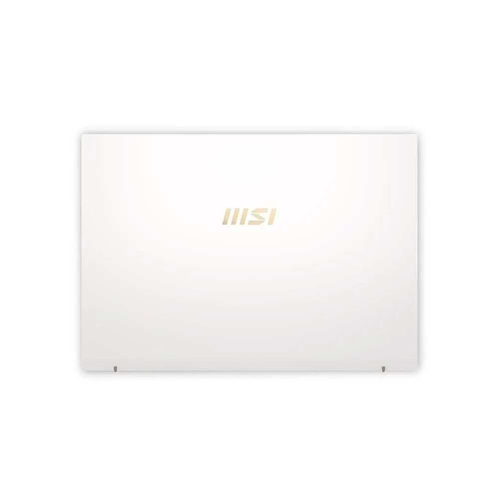 Kapalı beyaz dizüstü bilgisayar, kapağında altın rengi MSI logosu.