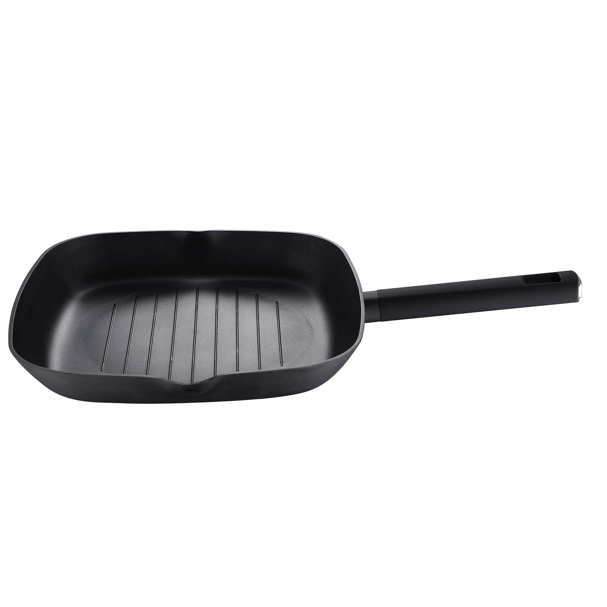 Una sartén grill negra con mango y estrías interiores.