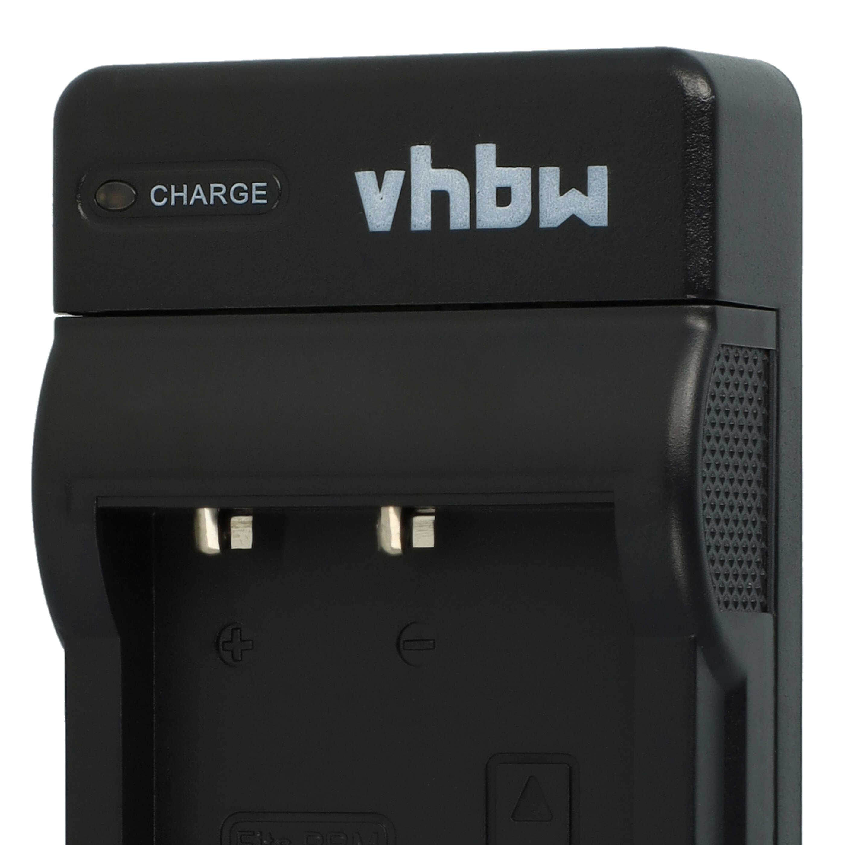 Schwarzes Ladegerät mit "vhbw" und "CHARGE" Schriftzug. Kontakte sichtbar.