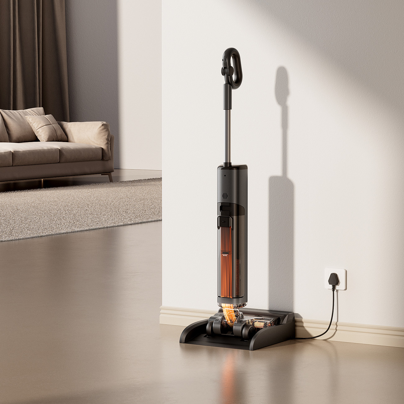 Nowoczesny odkurzacz stoi w salonie obok gniazdka ściennego.