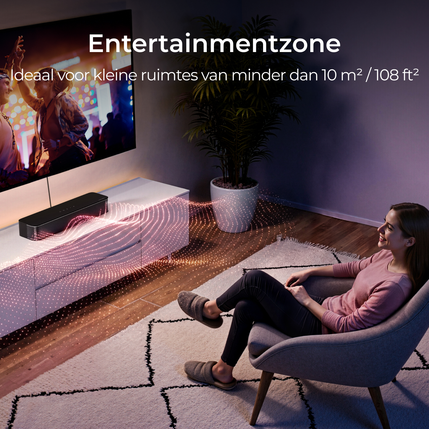 Woman relaxes in armchair watching TV with soundbar.
