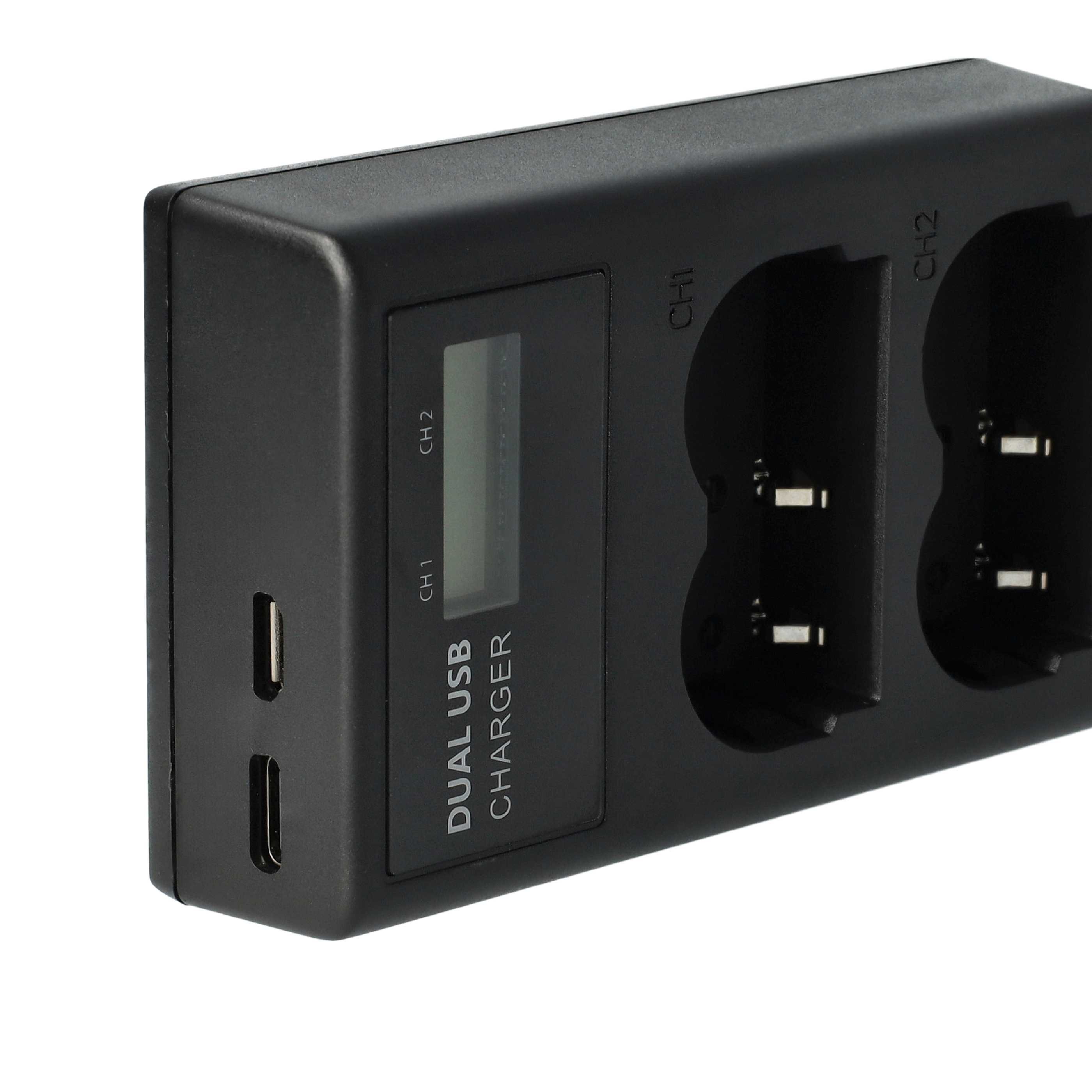 Schwarzes Dual-USB-Ladegerät mit Display und Ladebuchten.