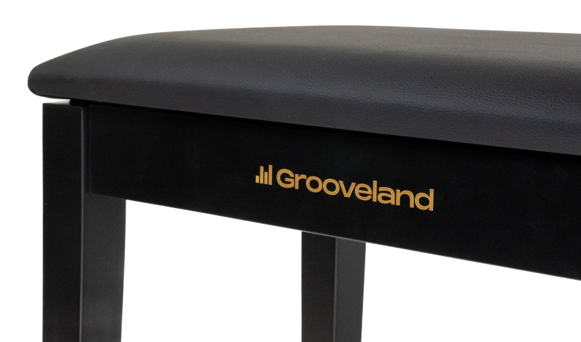 Schwarzer Klavierhocker mit goldener "Grooveland"-Prägung. Detailansicht.