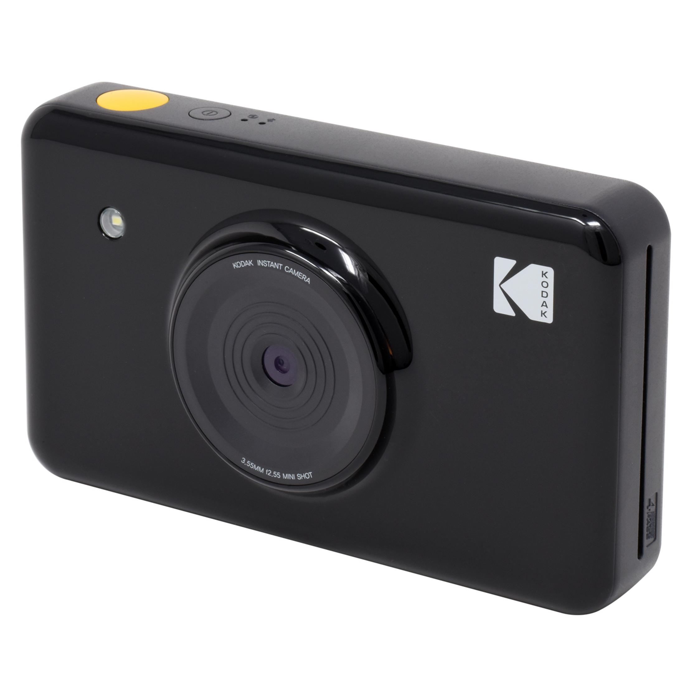 Una fotocamera istantanea Kodak nera con pulsante e obiettivo gialli.