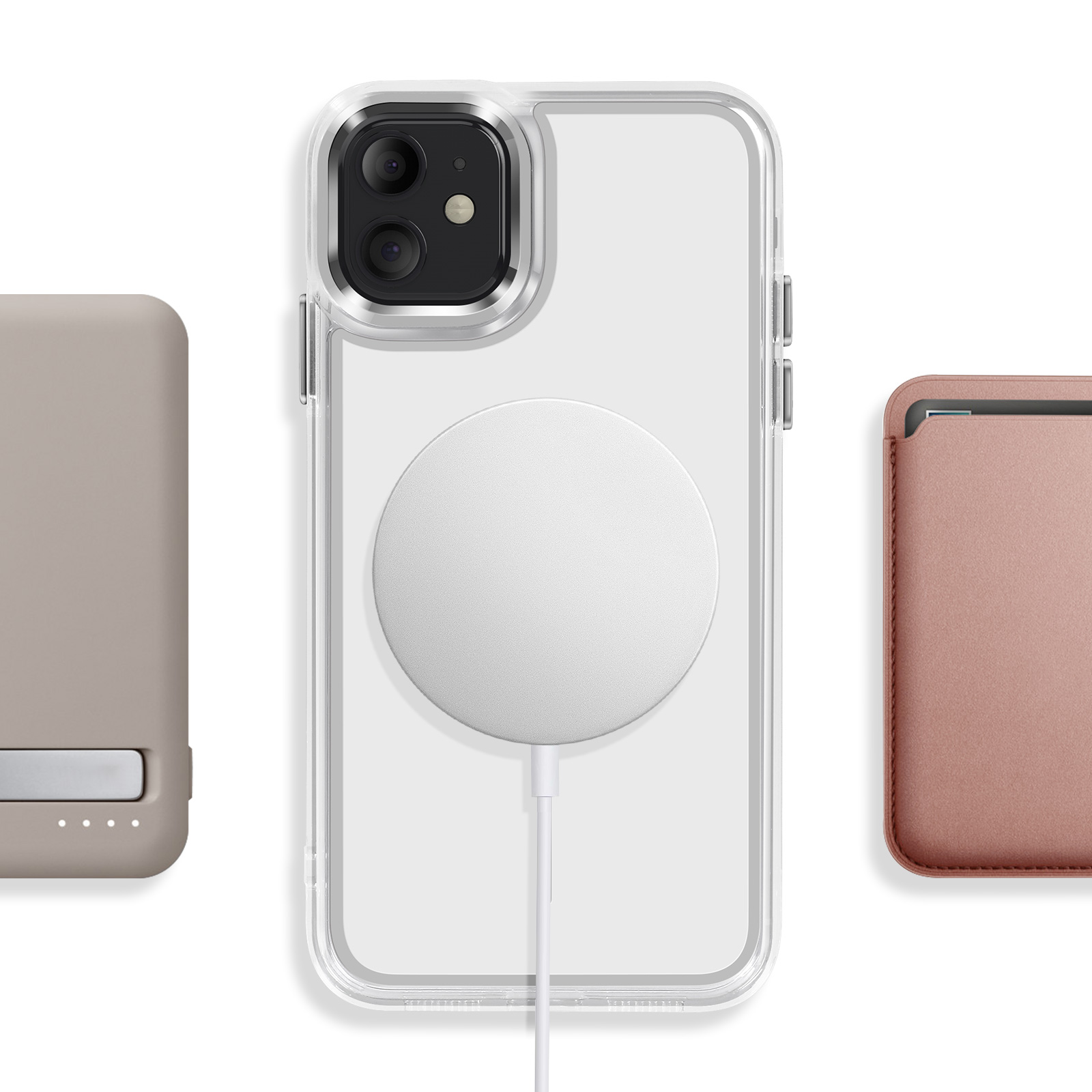 Een doorzichtige telefoonhoes met wit oplaadsnoer, naast grijze en roze accessoires.