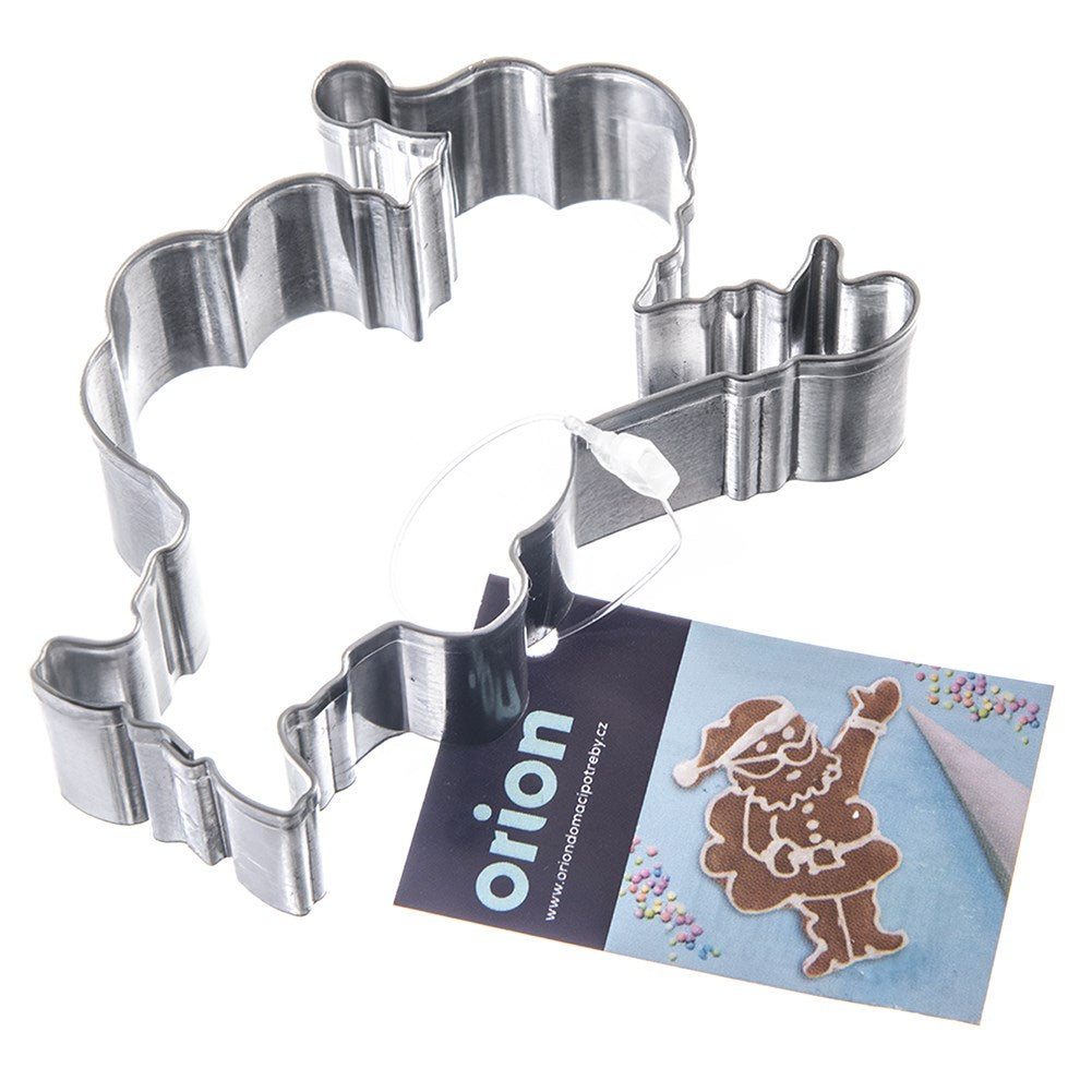 Un cortador de galletas de metal con forma de Papá Noel y una etiqueta.