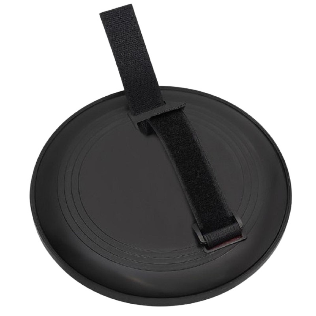 Objeto redondo negro con correa de velcro.