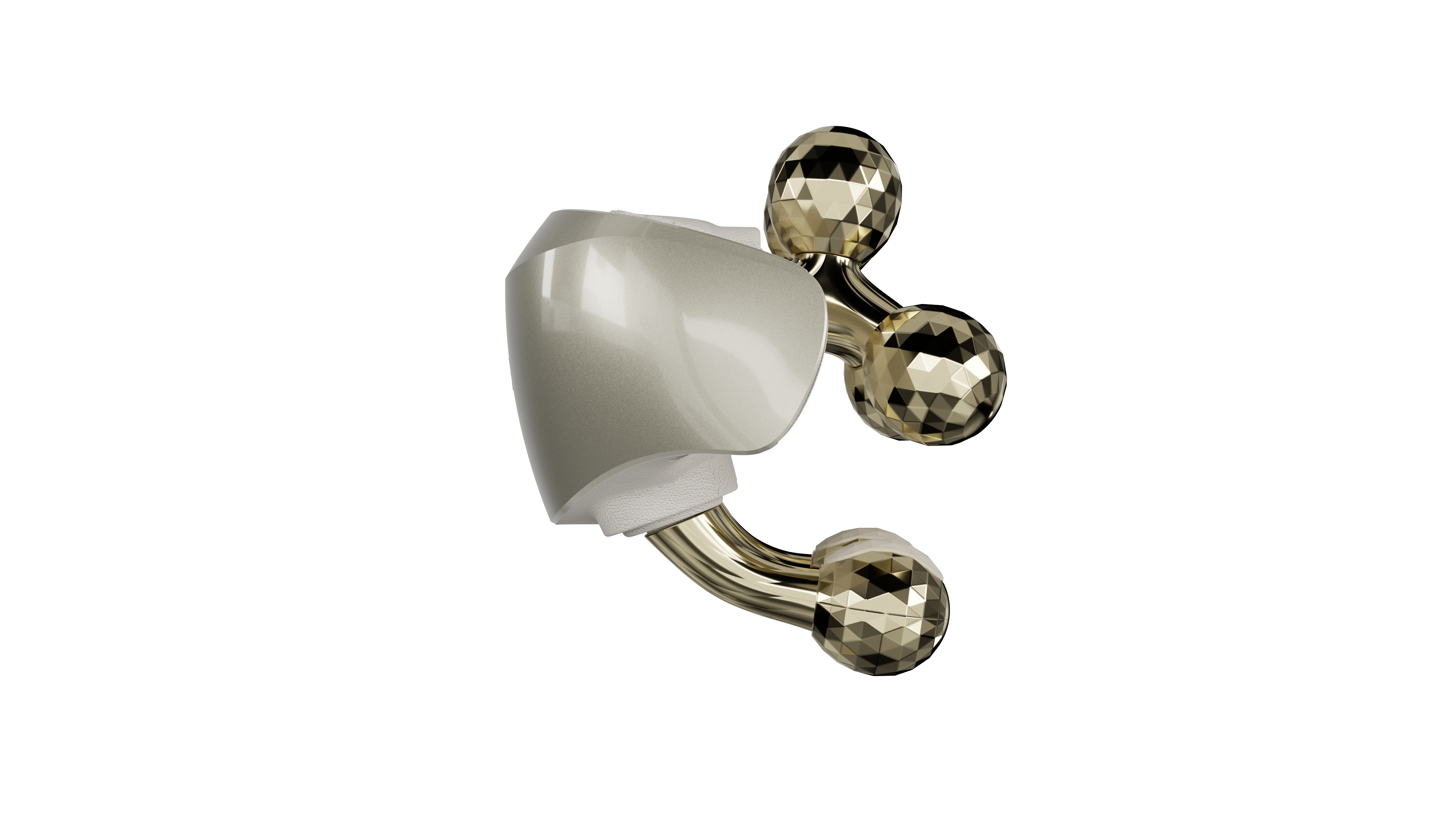 Ein silbernes und goldenes Gesichtsrollgerät mit Facettengloben.