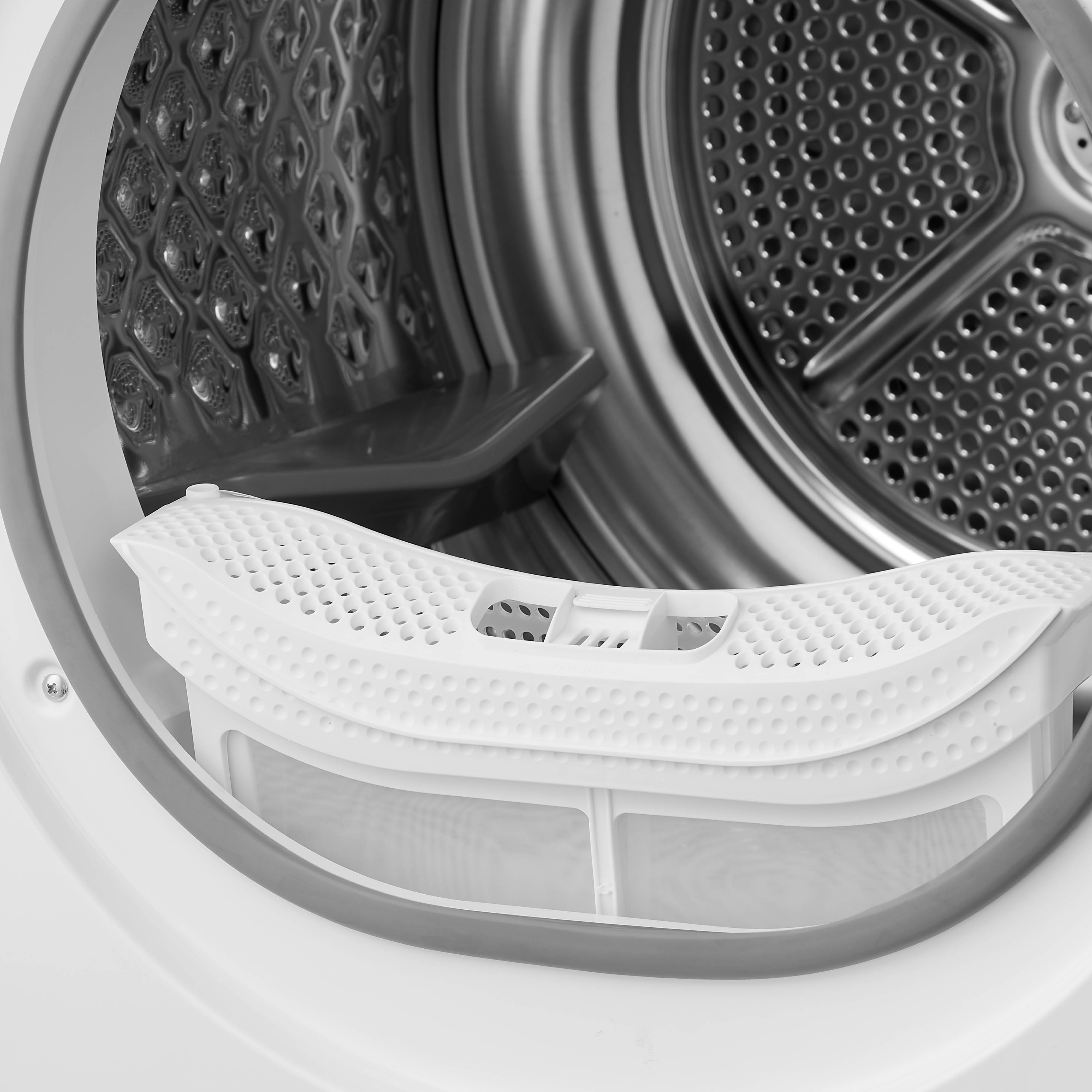 Close-up view inside a clothes dryer, focusing on the lint filter.