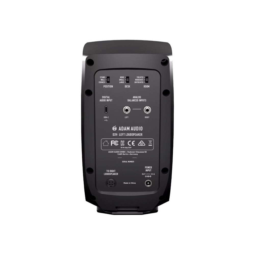 Tył czarnego głośnika z portami, etykietami i logo.