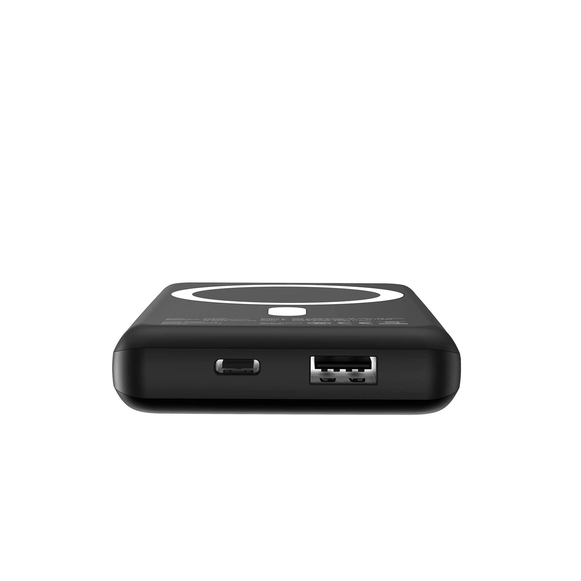 Schwarzes Powerbank mit USB-A- und USB-C-Anschluss, weißem Kreis auf der Oberseite.