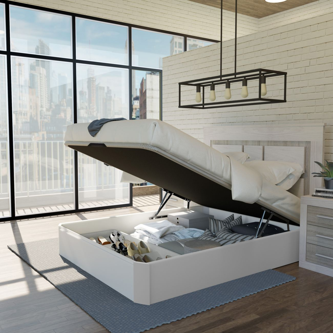 Una cama blanca con almacenamiento se abre, mostrando zapatos y almohadas. Ventanas grandes con vista a la ciudad.