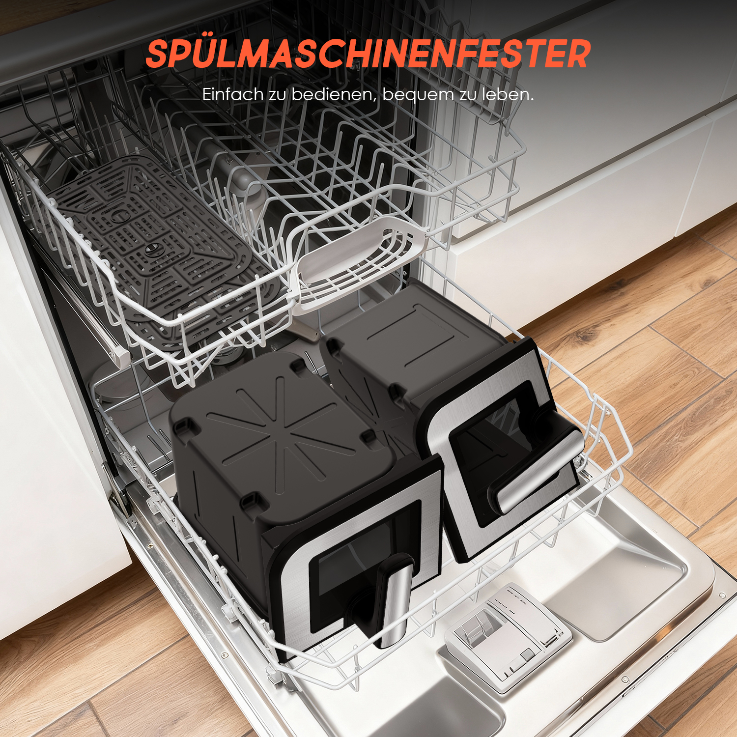 Zwei schwarze Airfryer-Körbe in einem offenen Geschirrspüler auf einem Drahtgestell.