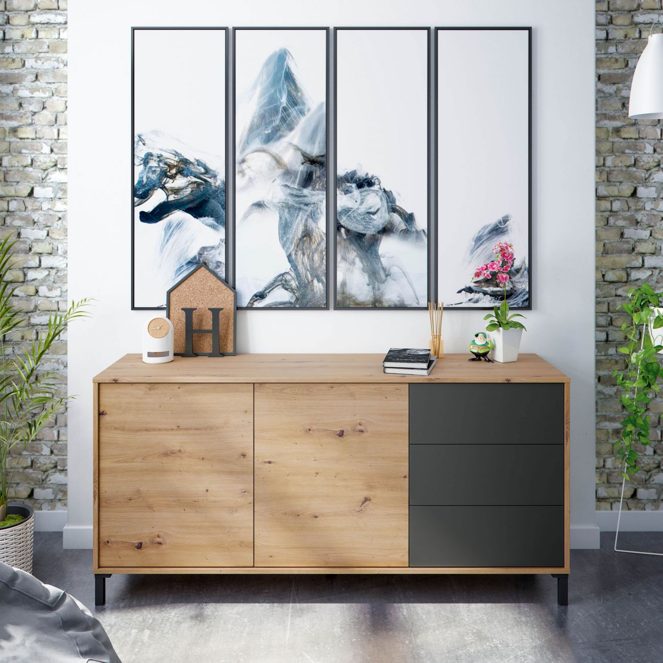 Un aparador de madera con cuatro cuadros abstractos y plantas.