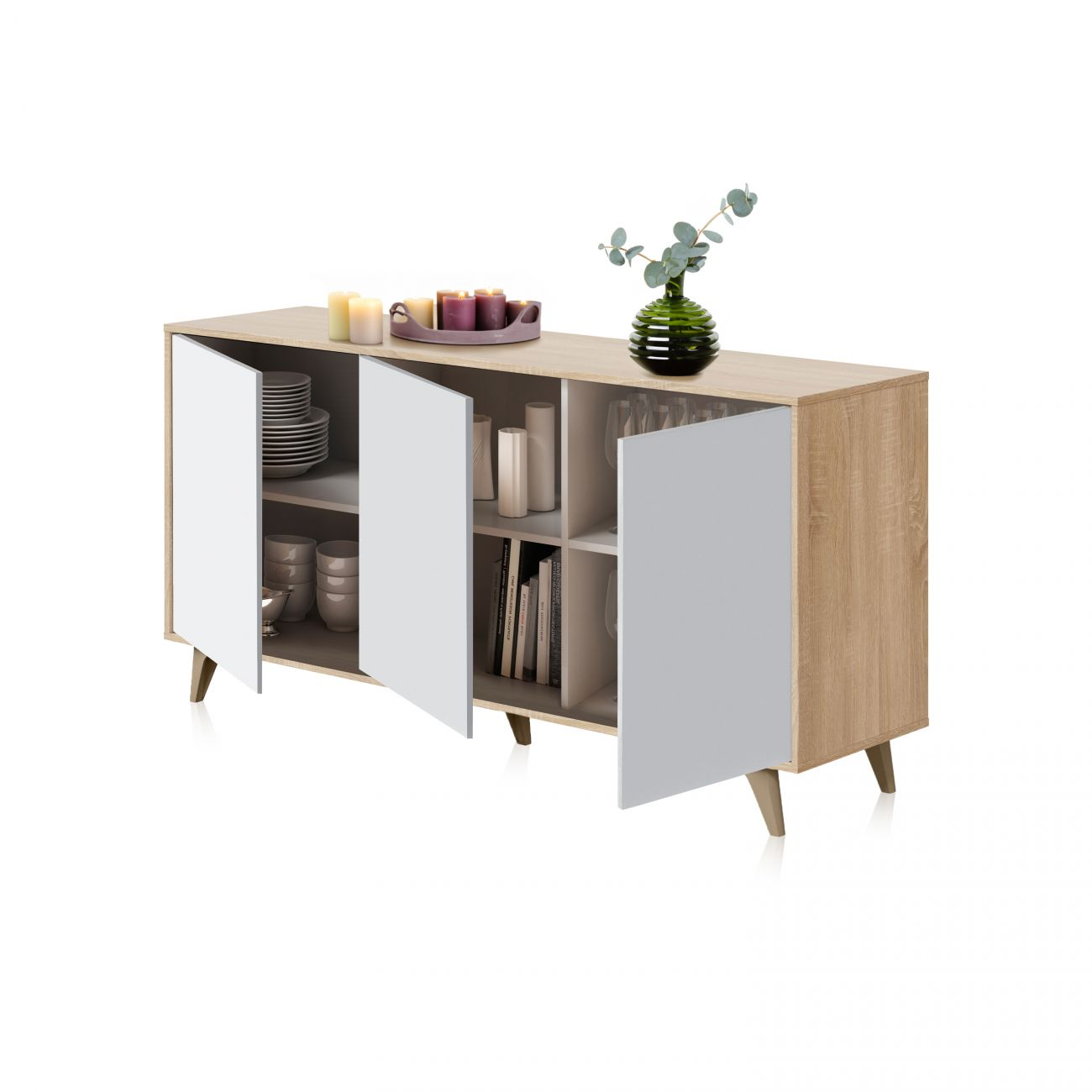 Un aparador de madera con puertas blancas, con vajilla, libros y decoración.