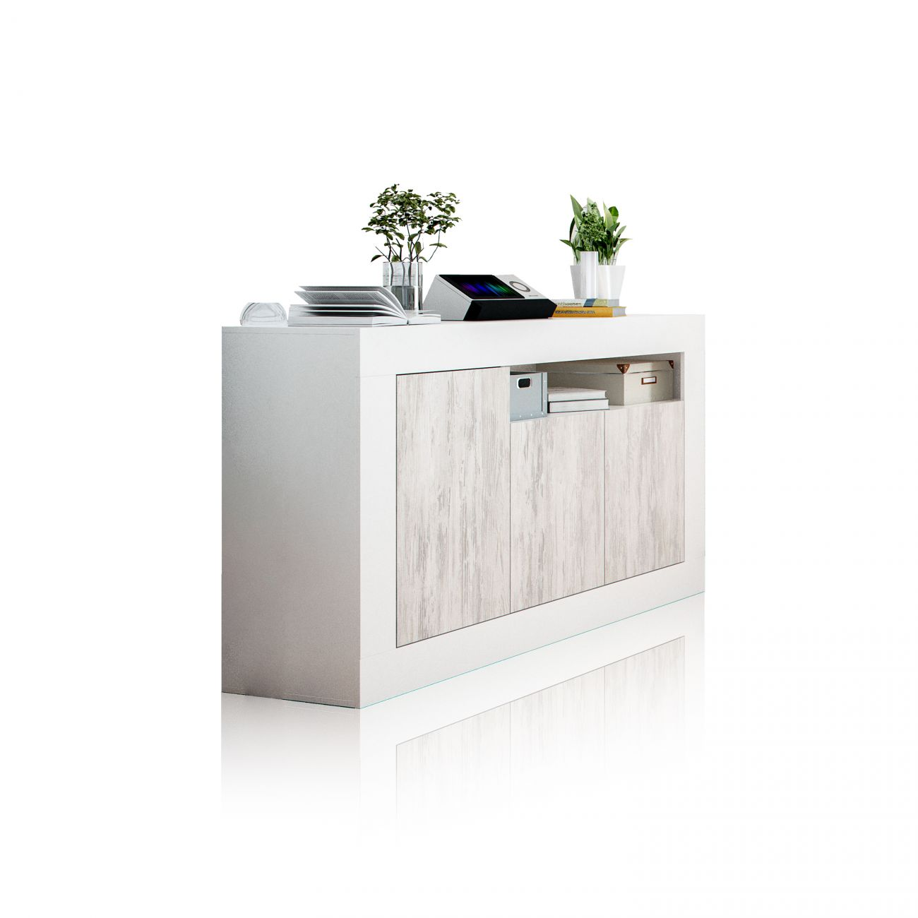 Un aparador blanco con puertas de madera, con plantas, libros y un dispositivo.