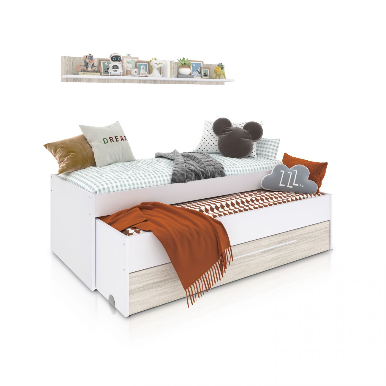 Una cama blanca con cama nido, cojines, mantas y estante de pared.
