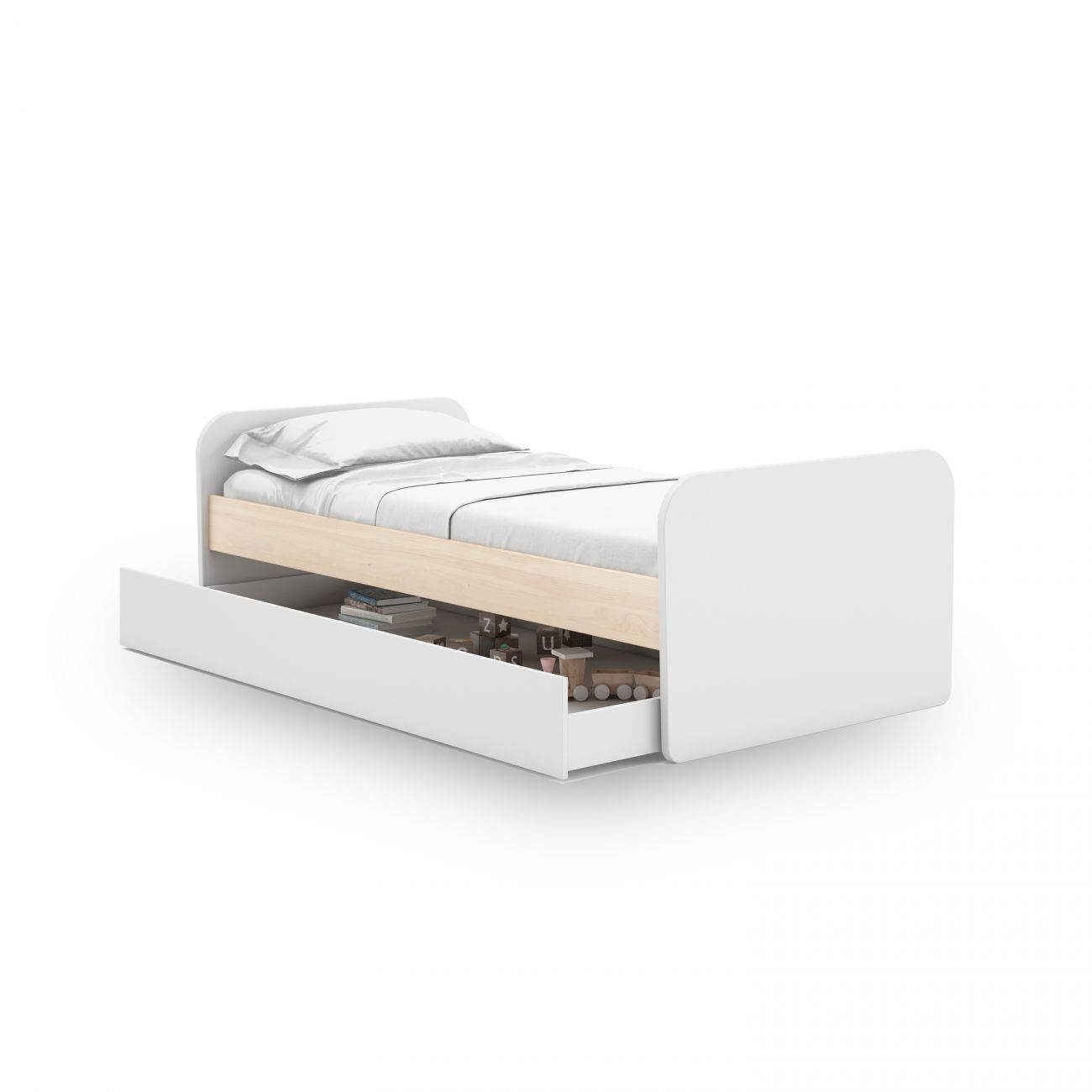 Una cama blanca con ropa de cama y un cajón extraíble con juguetes.