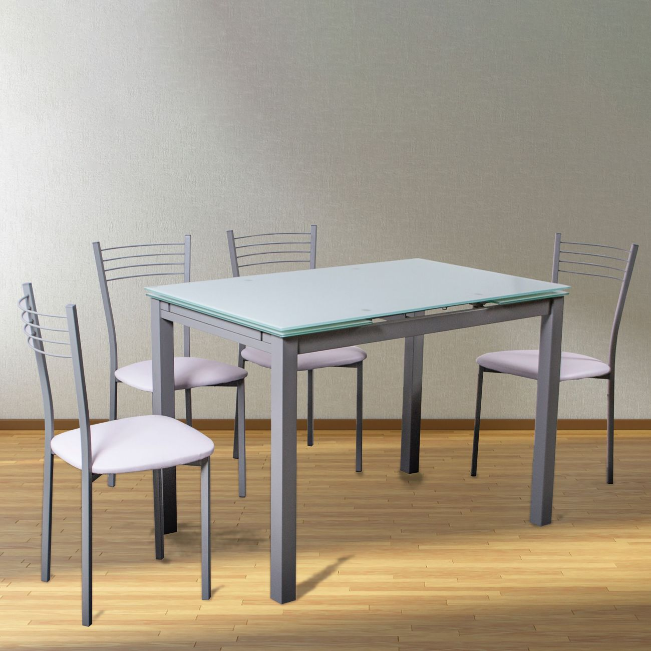 Mesa de cristal con estructura metálica y cuatro sillas con asientos lila.
