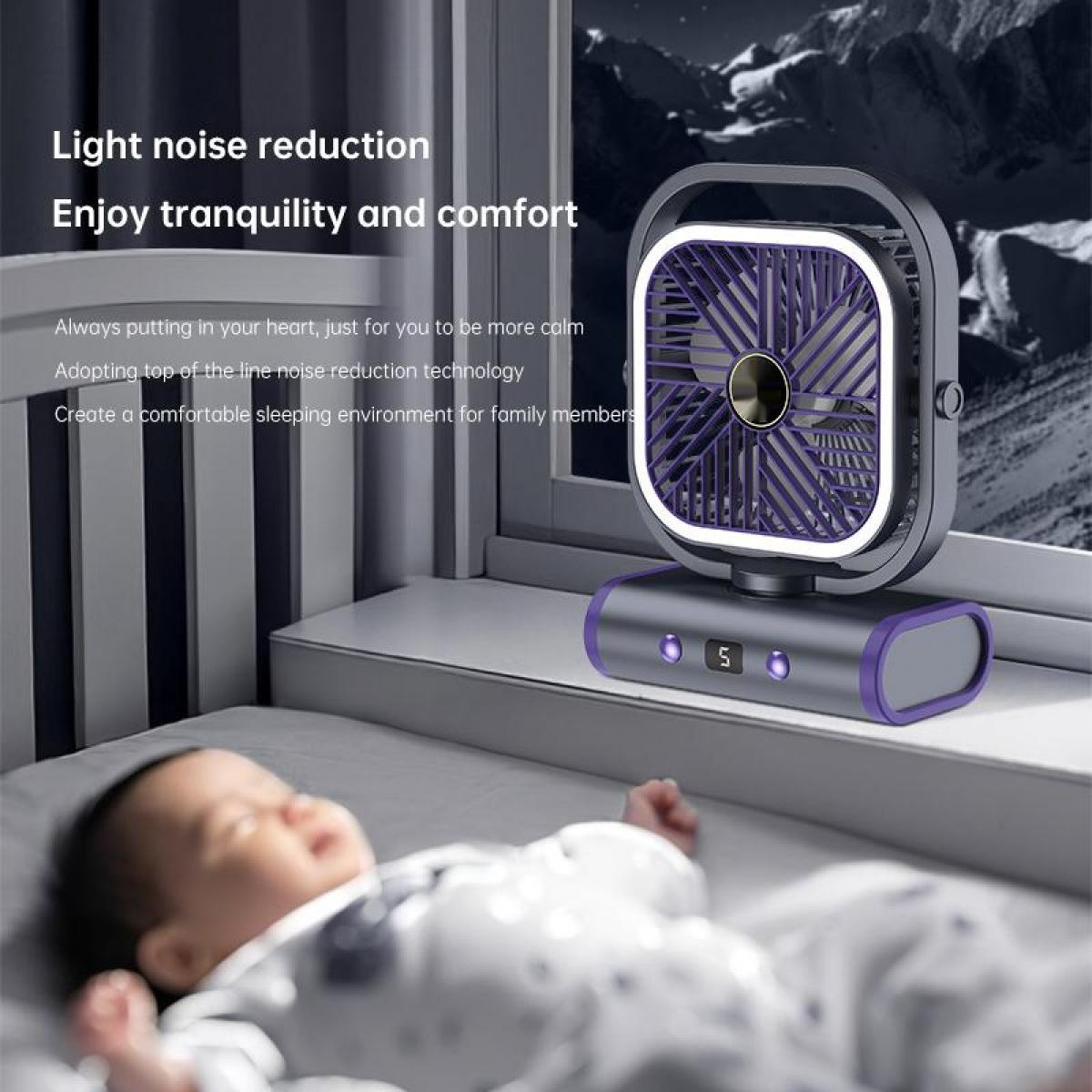 Ein kleiner Ventilator auf einer Fensterbank neben einem schlafenden Baby.
