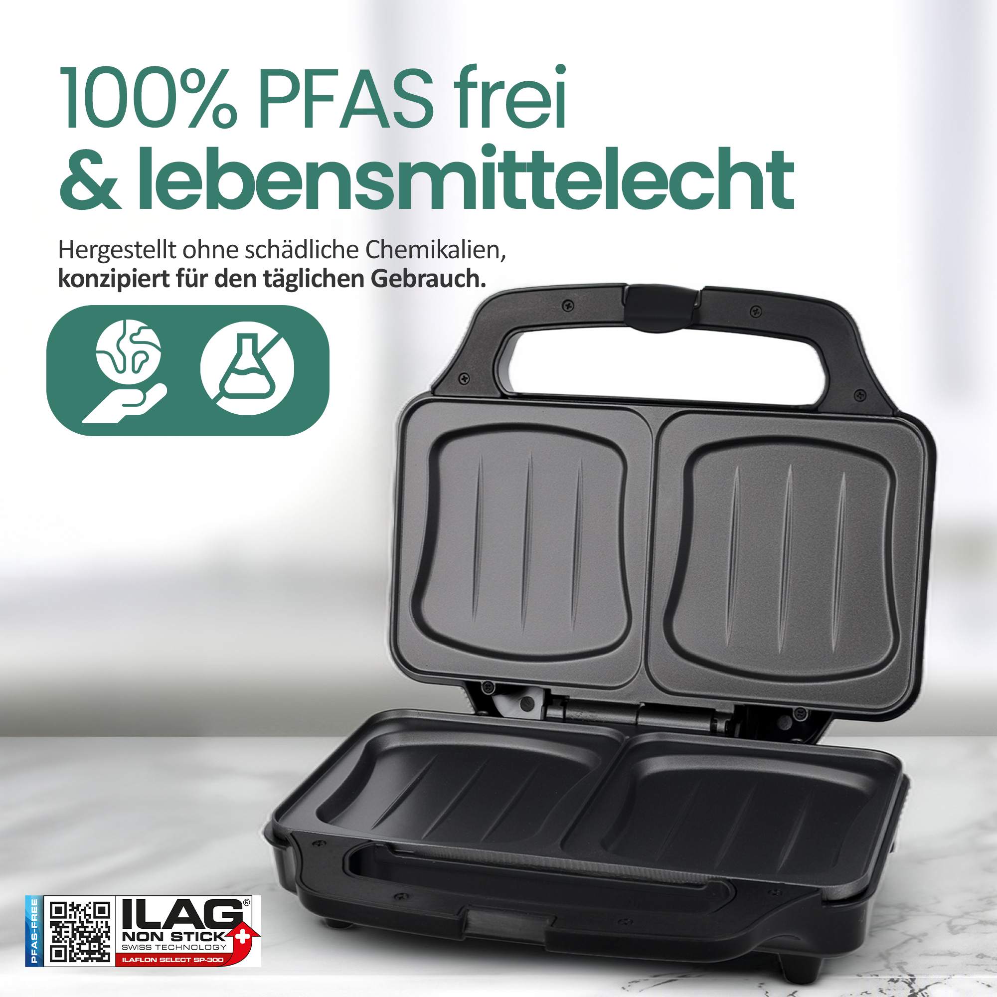 Ein offener schwarzer Sandwichmaker mit der Aufschrift 100% PFAS frei.