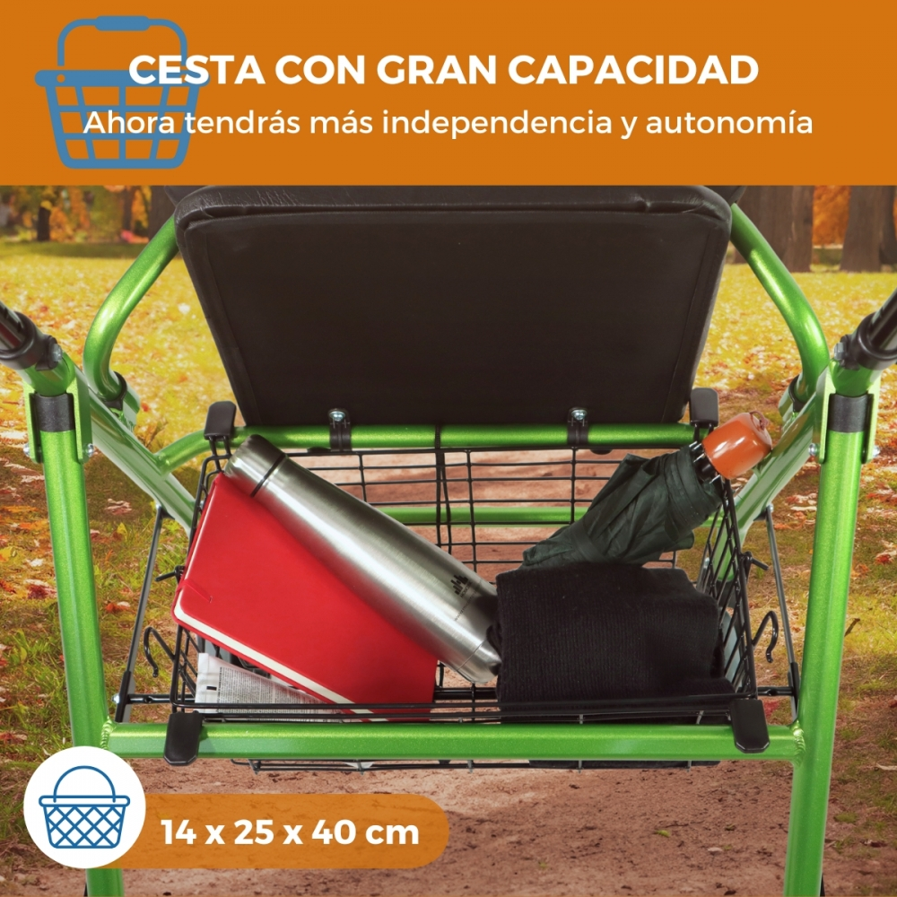 Un andador verde con cesta que contiene botella, libro y paraguas. Fondo exterior.