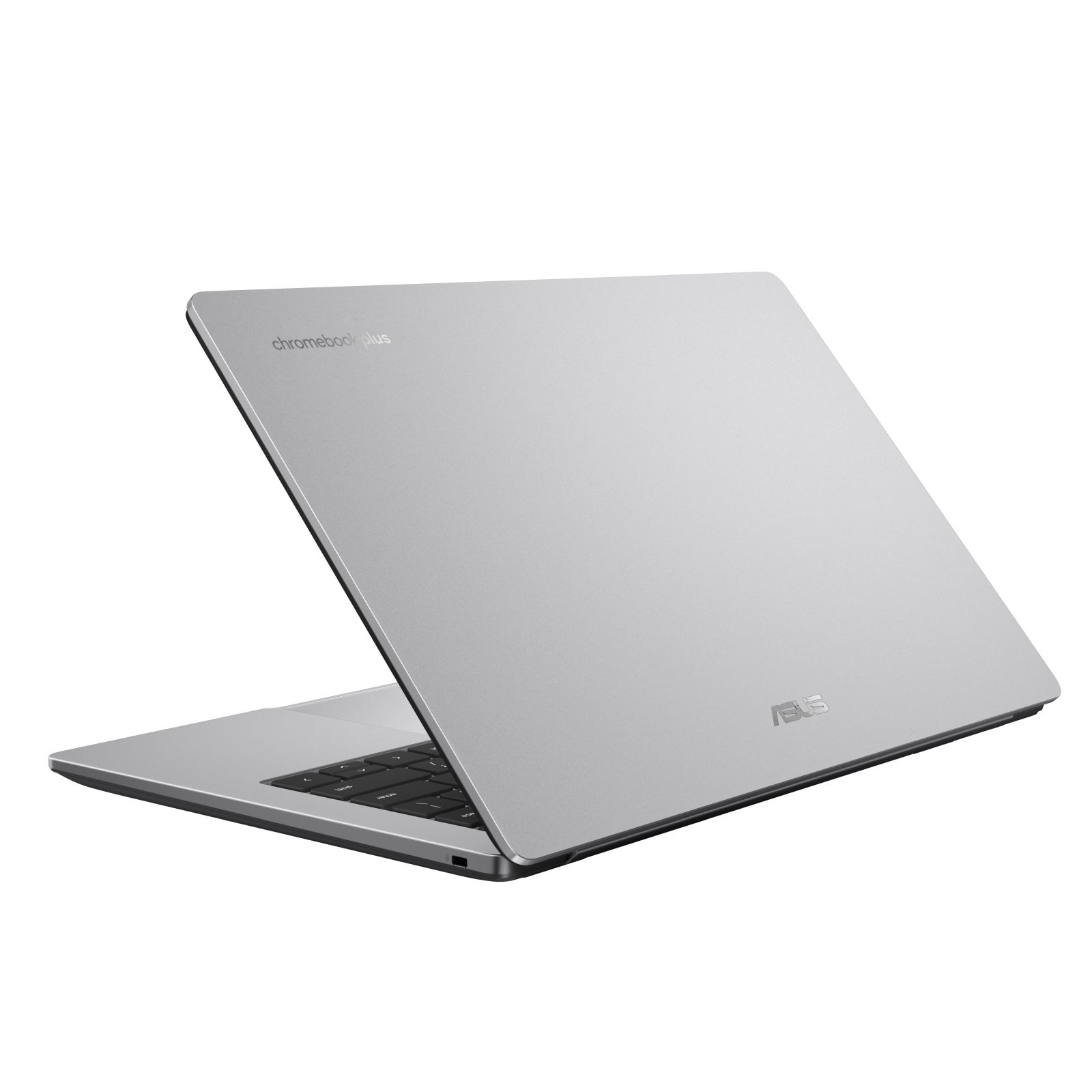Srebrny laptop Asus Chromebook Plus jest otwarty, widoczna klawiatura.