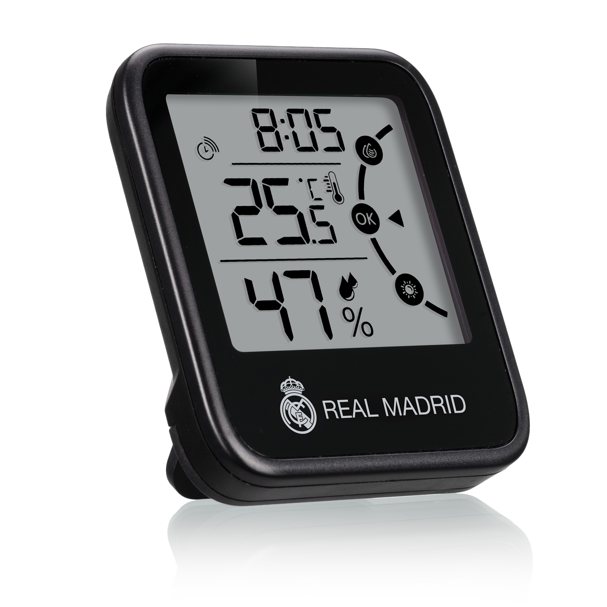 Un termómetro digital negro con logo del Real Madrid muestra 25,5°C y 47% humedad.