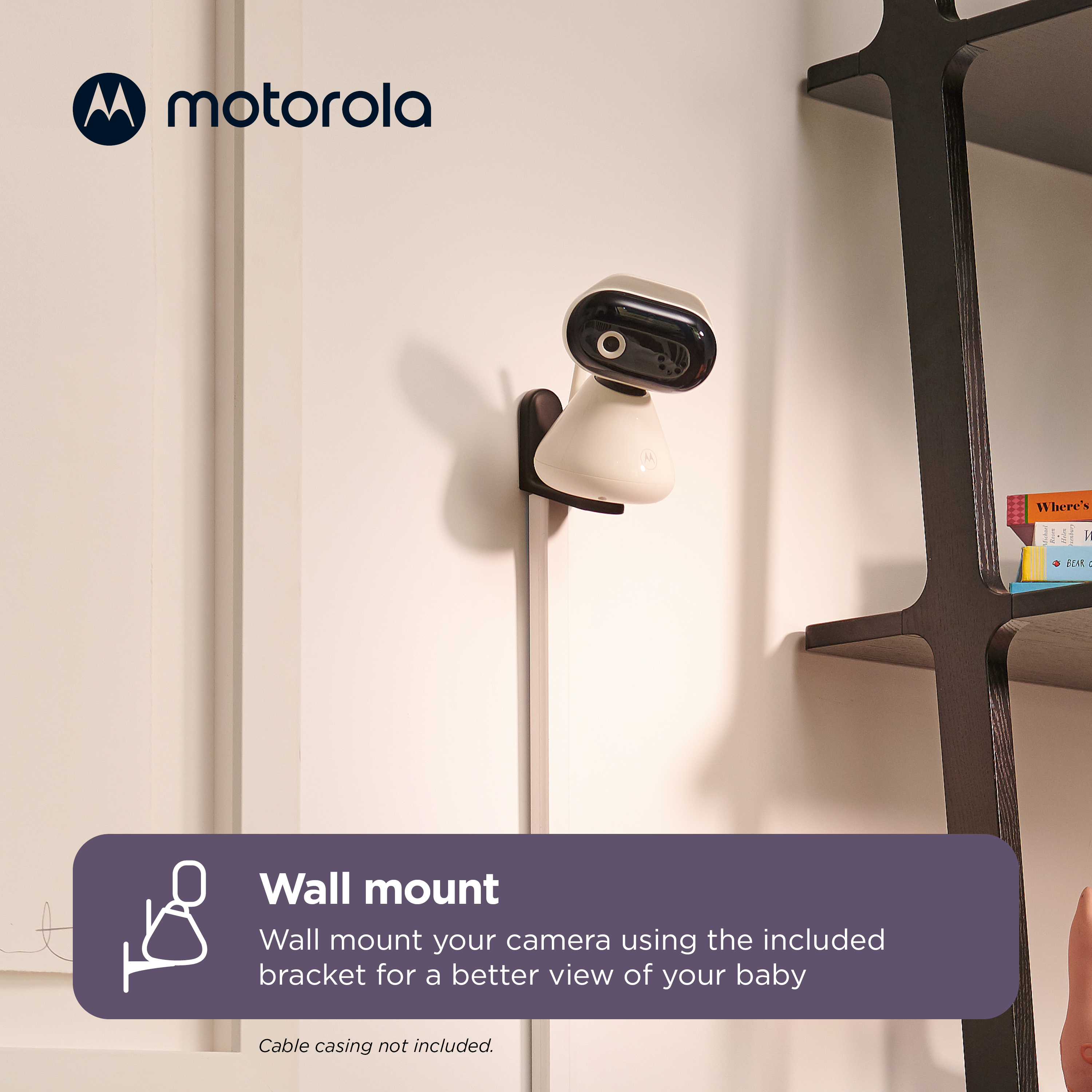 Baby monitor Motorola montato a parete. Il testo dice "Supporto a parete".