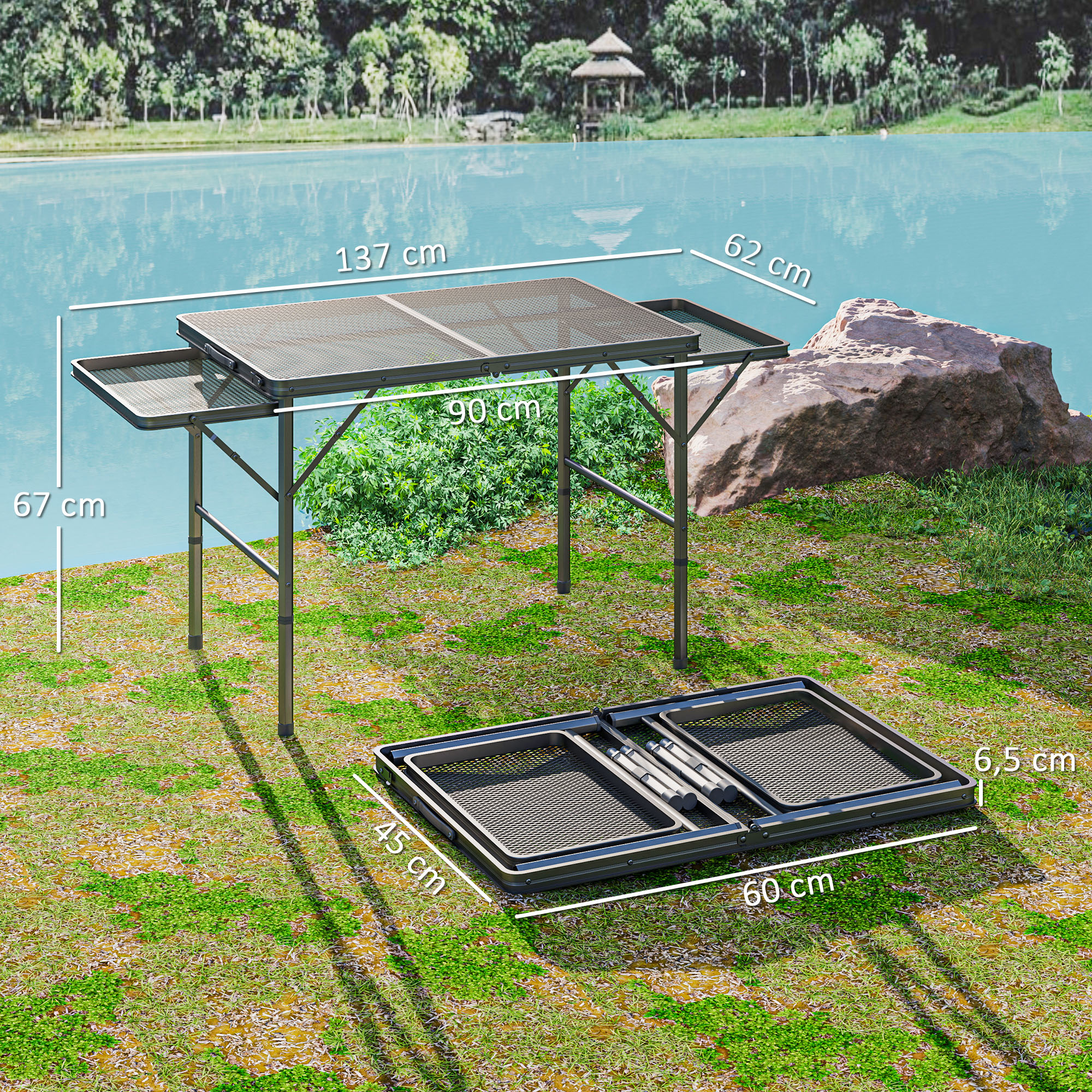 Una mesa plegable con dimensiones se encuentra junto a un lago, cerca de una roca.