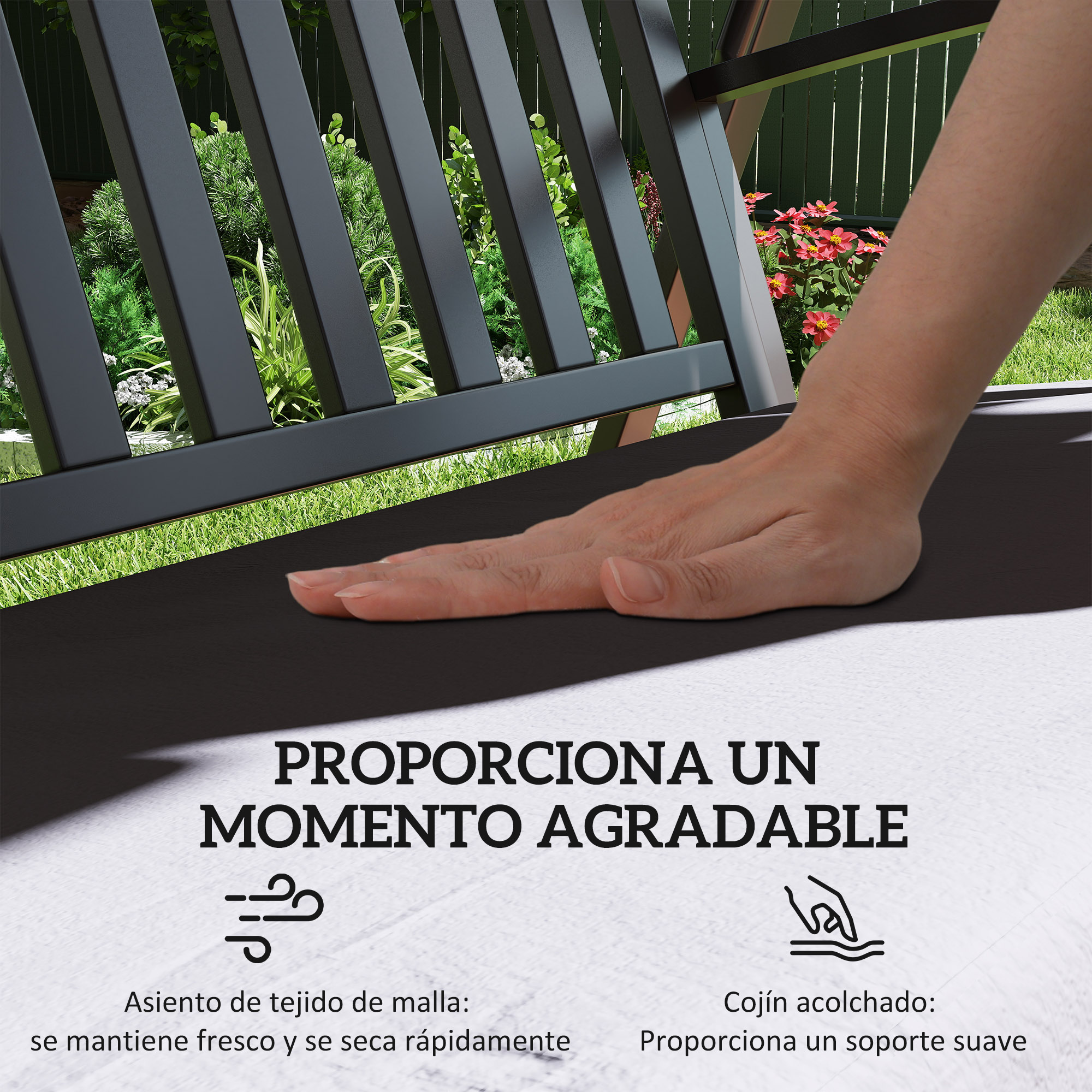 Una mano descansa sobre un cojín negro junto a un marco oscuro con plantas verdes.