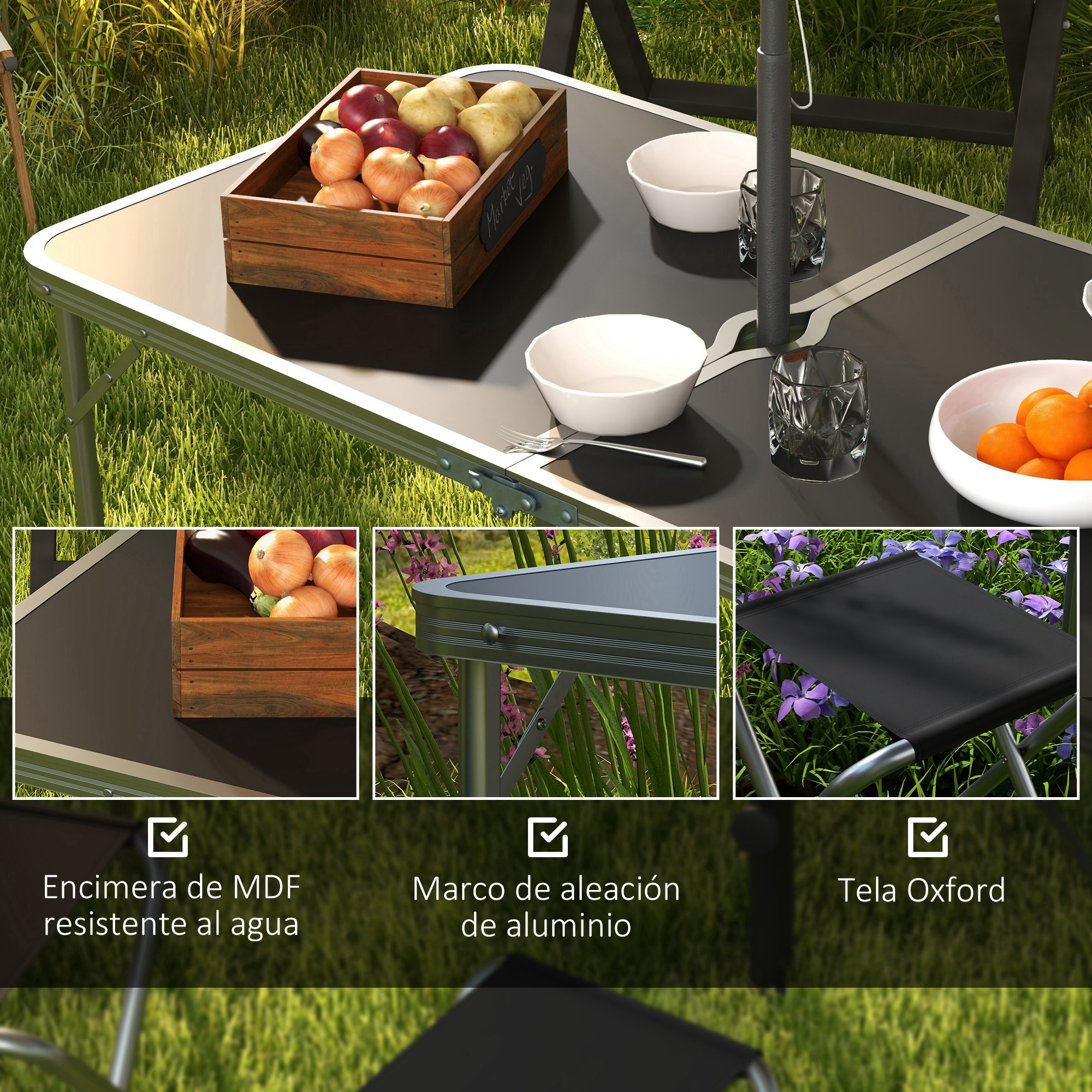 Una mesa plegable con frutas y verduras al aire libre sobre césped.