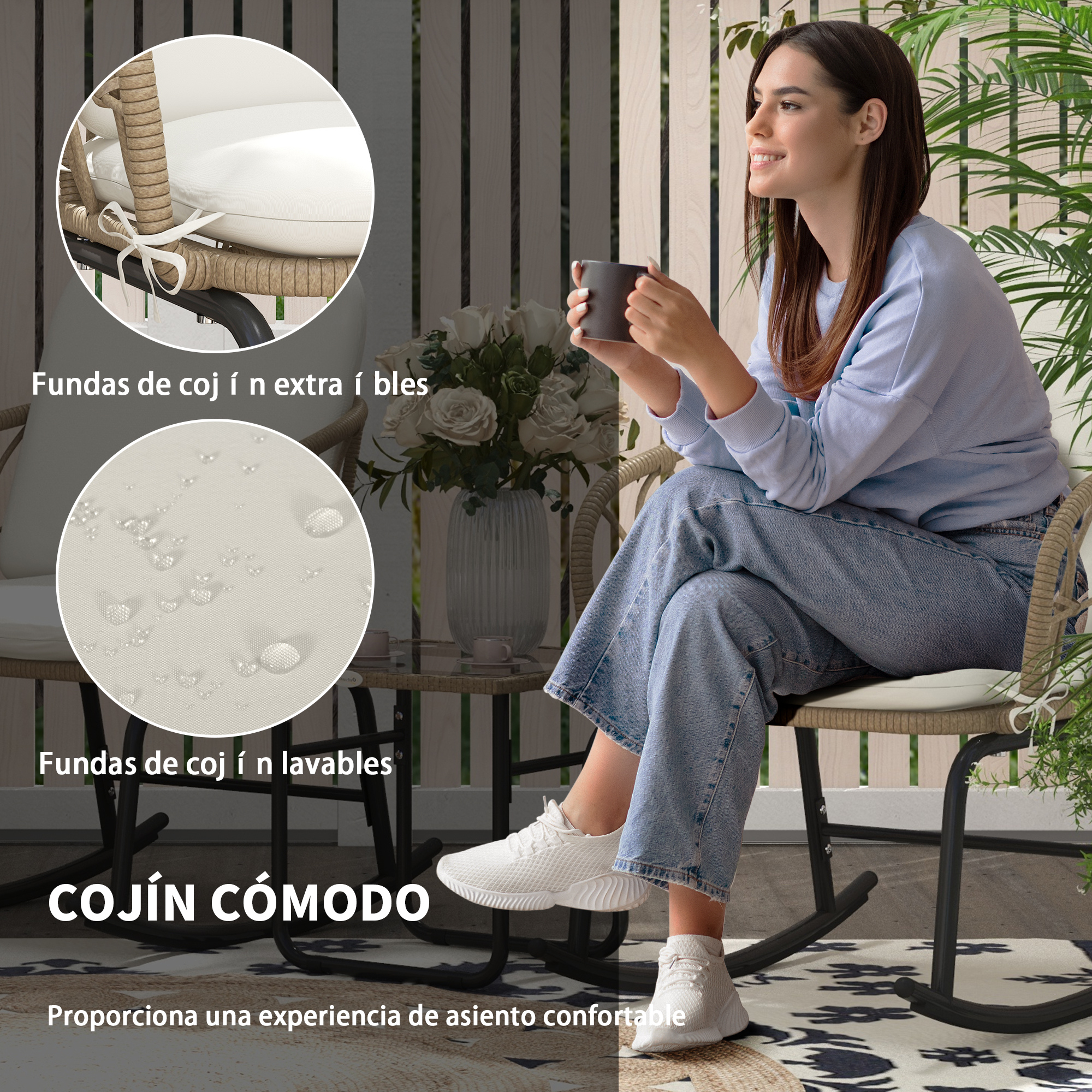 Una mujer sentada en una silla de ratán con cojines, sosteniendo una taza.