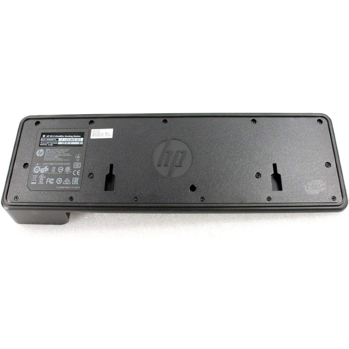 Onderkant van een zwarte HP docking station met logo's en certificeringsmerken.