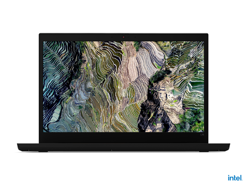 A black laptop displaying an image of terraced fields on its screen.
