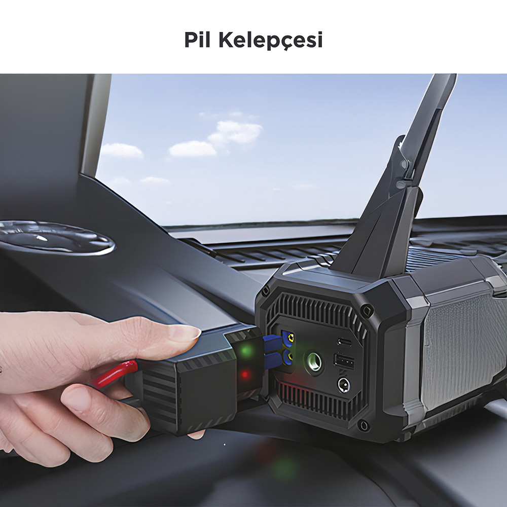 Bir el, çeşitli bağlantı noktalarına sahip taşınabilir bir güç istasyonuna siyah bir kablo takıyor.