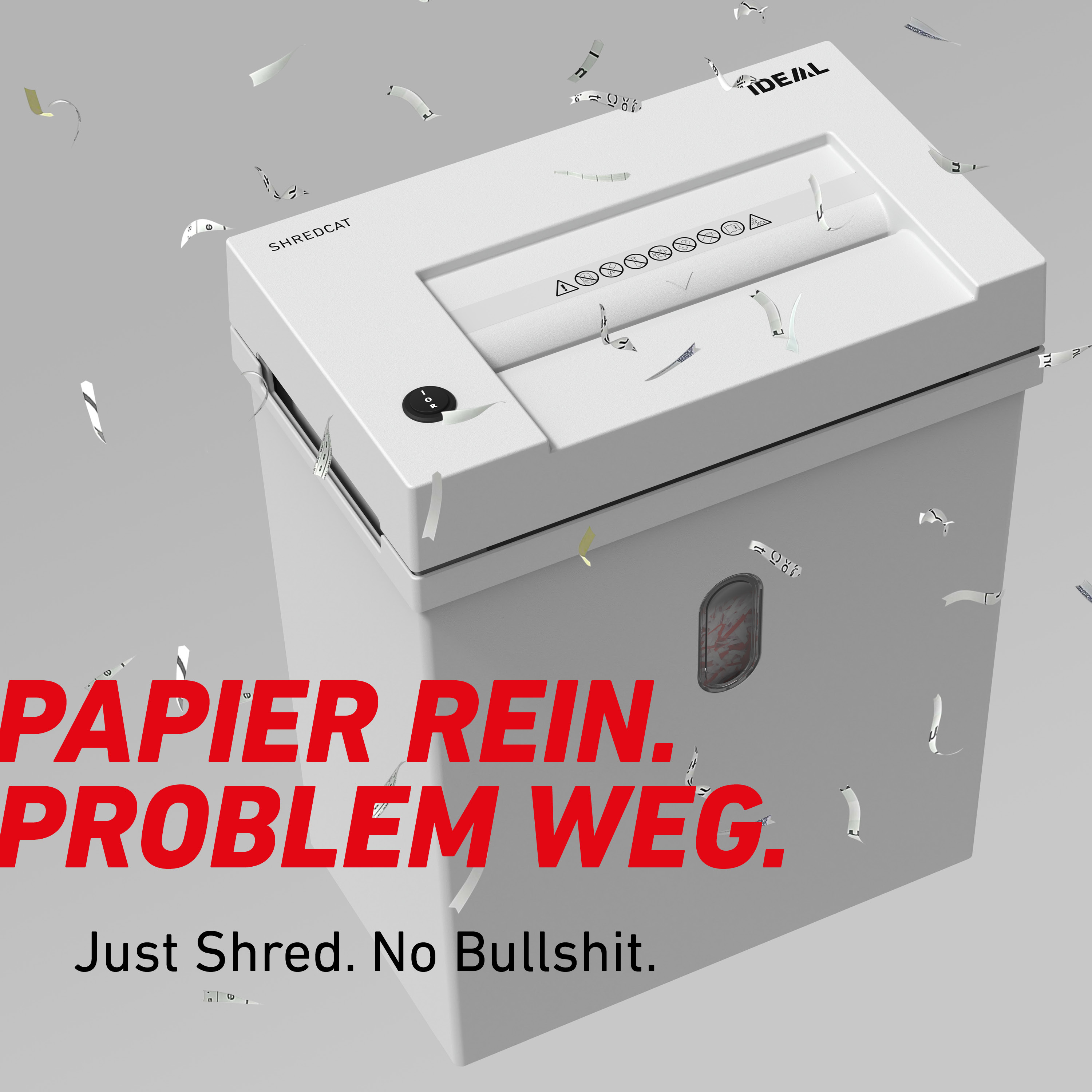 Ein weißer Aktenvernichter mit zerkleinertem Papier, das herumfliegt.