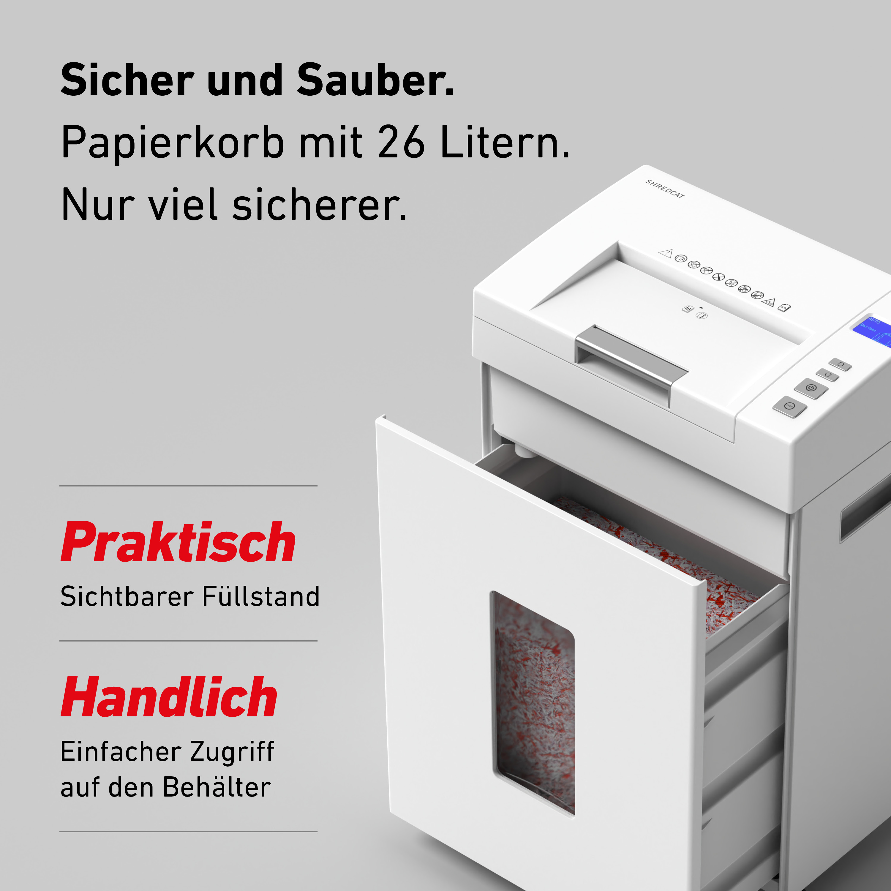 Ein weißer Aktenvernichter mit offenem Fach, gefüllt mit geschreddertem Papier.