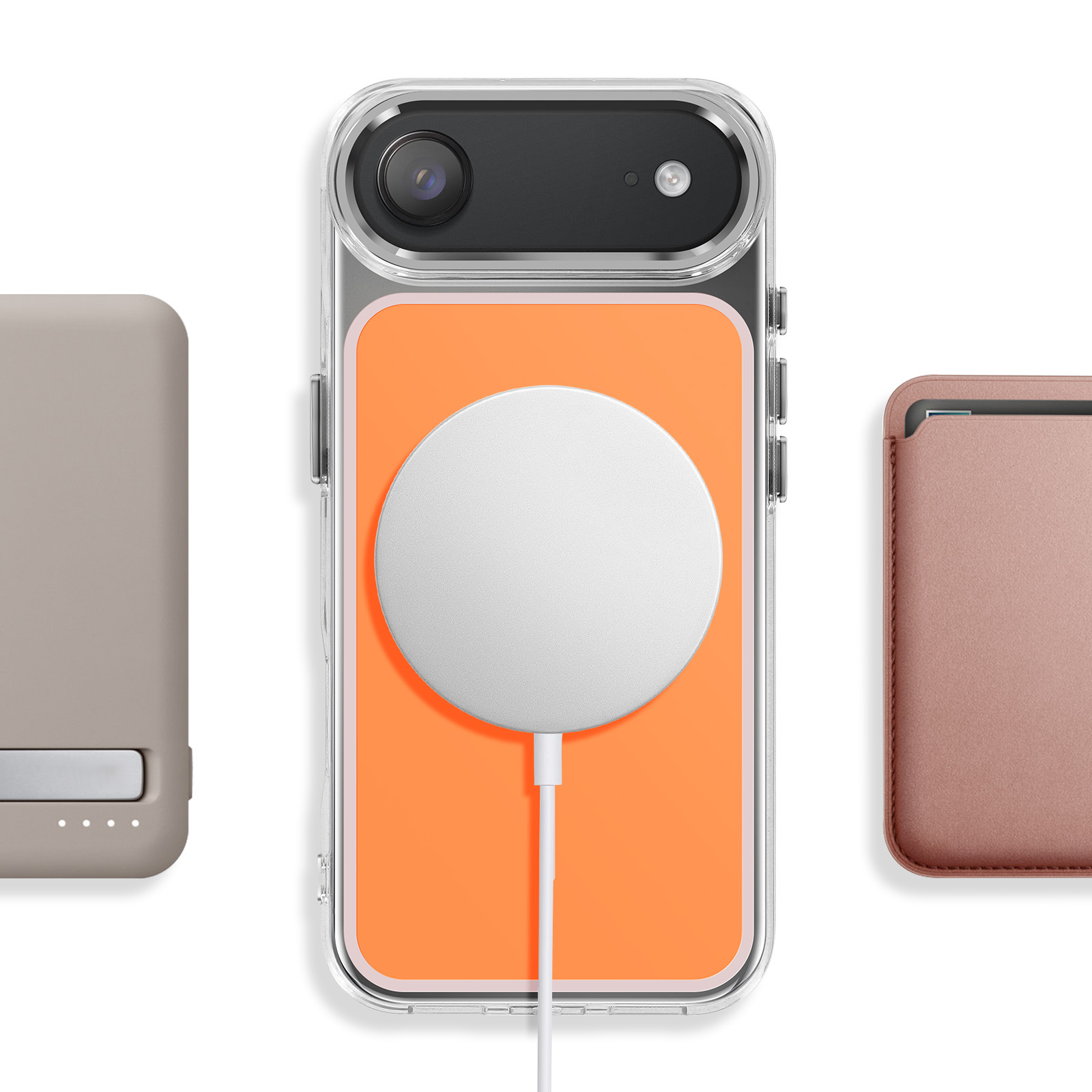 Grijze powerbank, oranje telefoonhoes met witte oplader, roze kaarthouder.