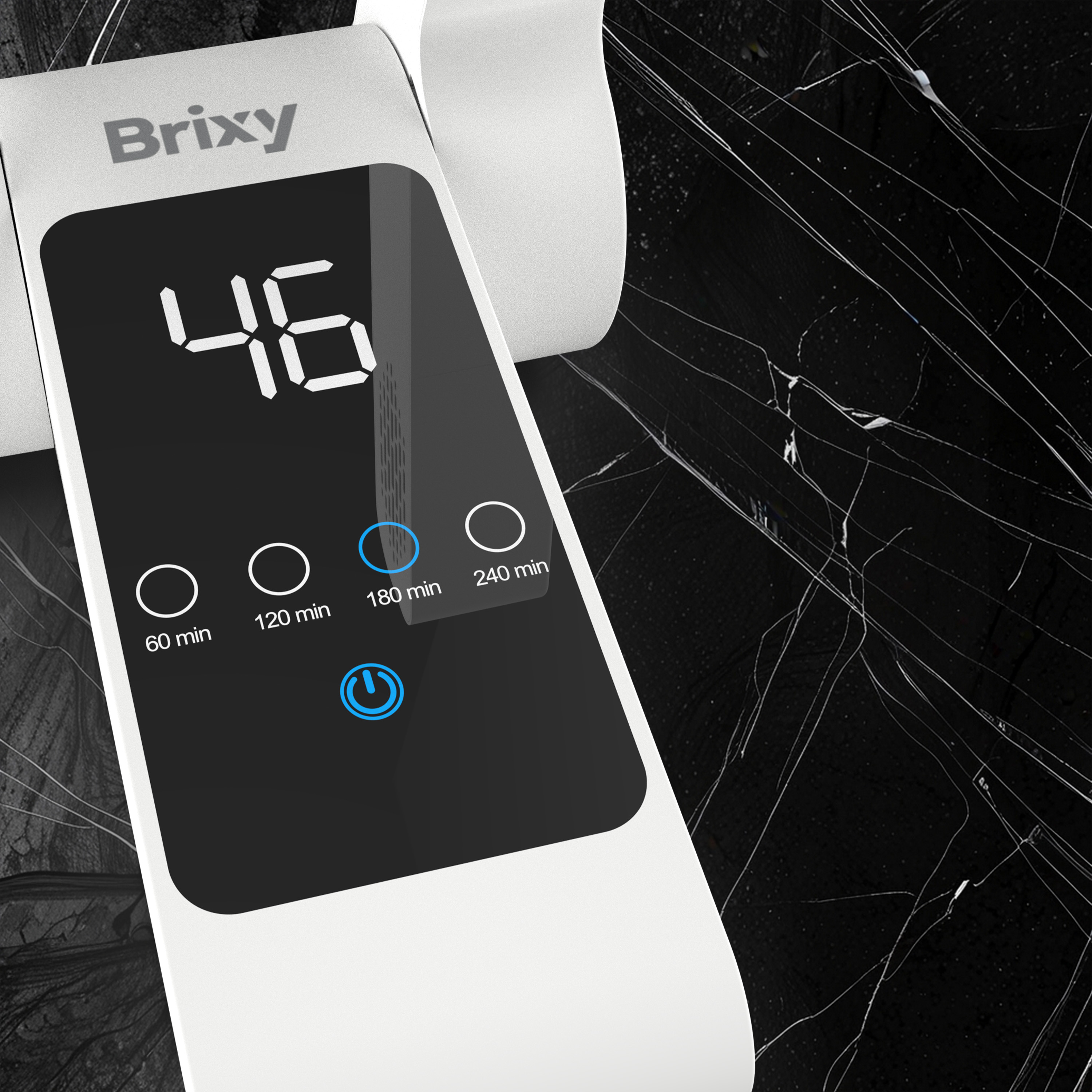 A white device labeled "Brixy" with a digital display showing "46".