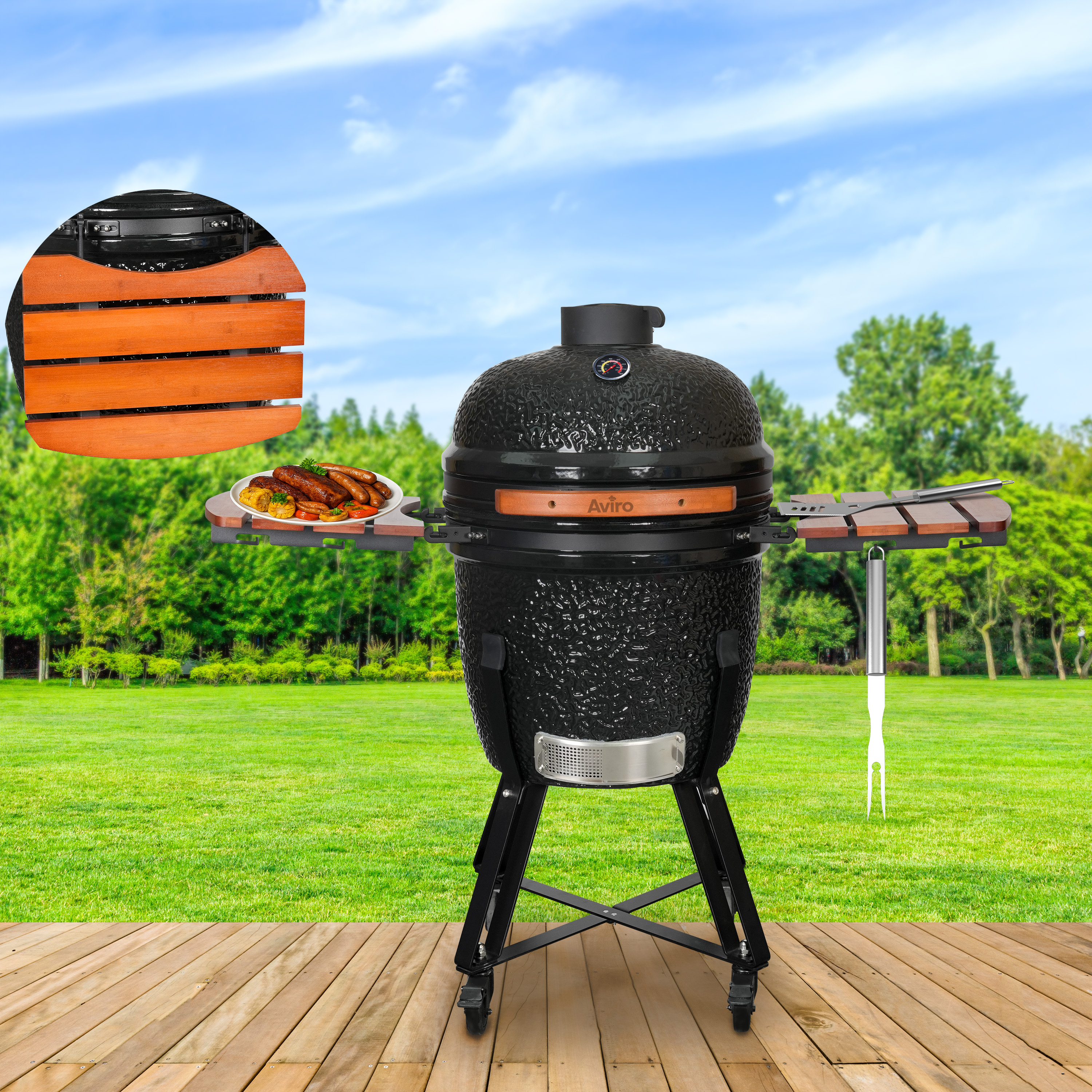 A black grill with wooden side tables sits on an outdoor wooden deck.