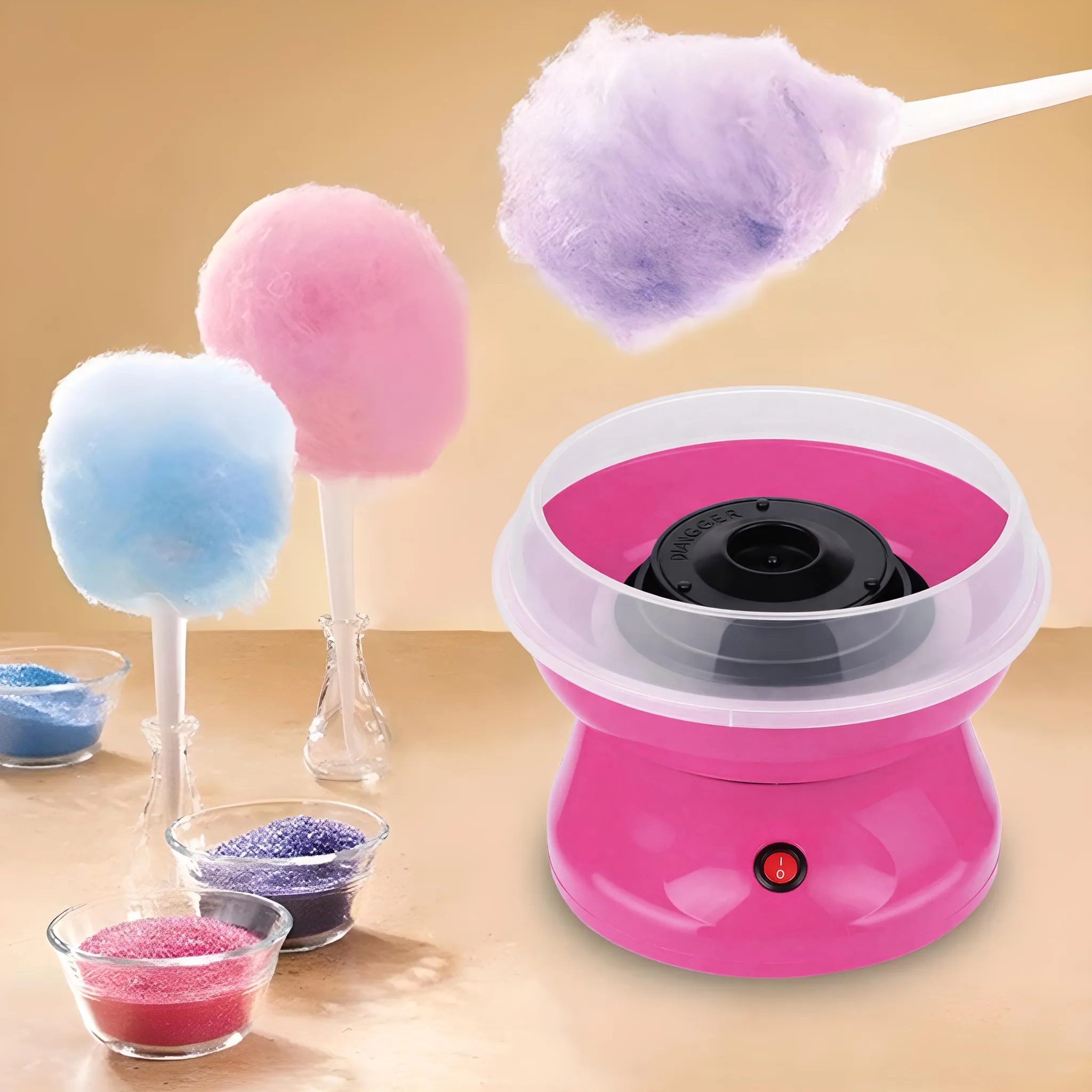 Eine rosafarbene Zuckerwatte-Maschine mit bunten Zuckerwatte-Wolken und Zuckerschalen.