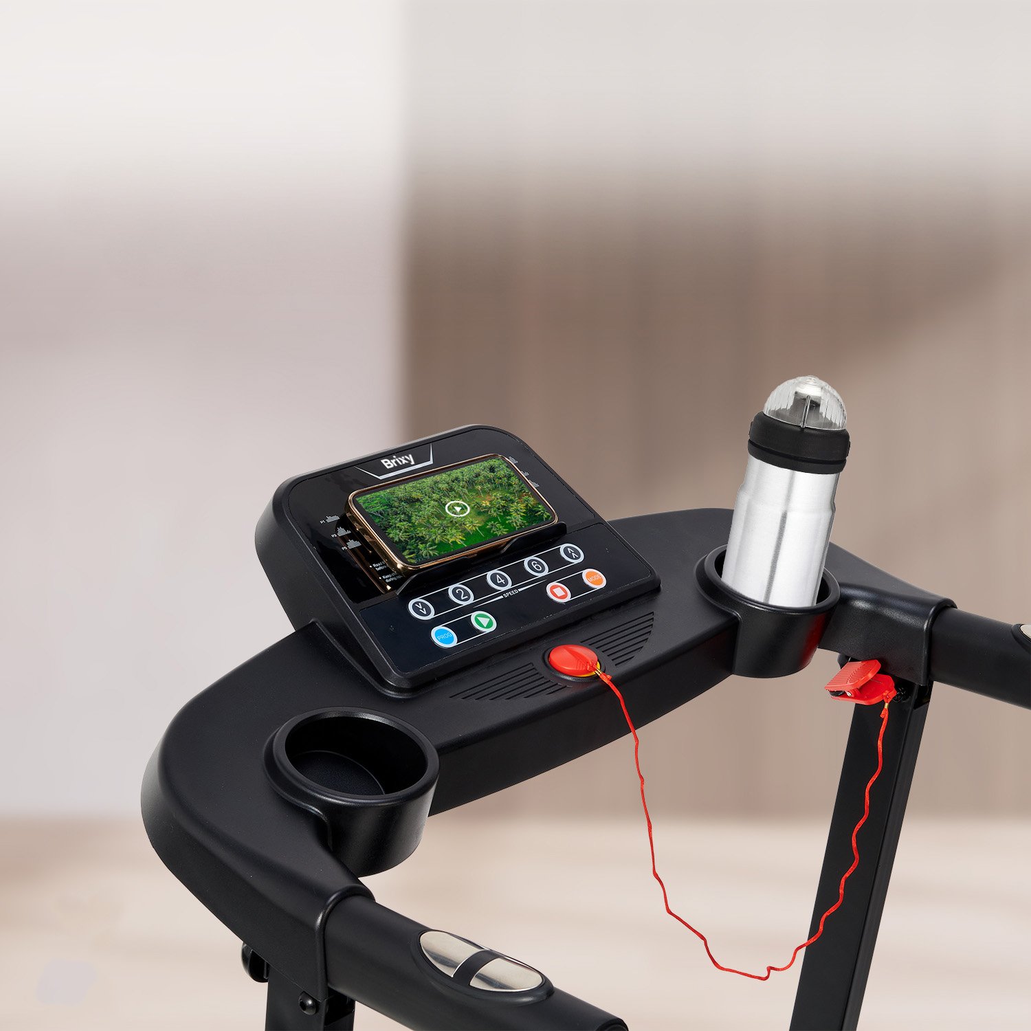 Black treadmill with phone holder, cup holder, and safety cord.