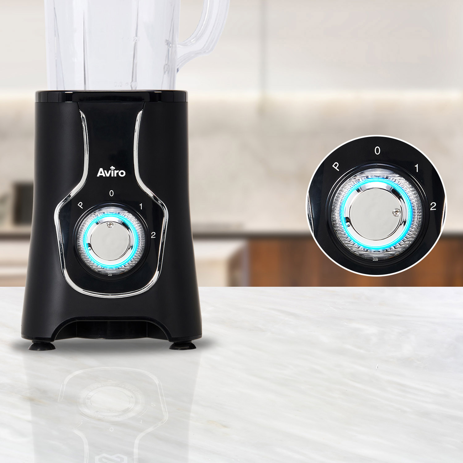 Black blender with blue illuminated control panel showing speeds 0, 1, and 2.