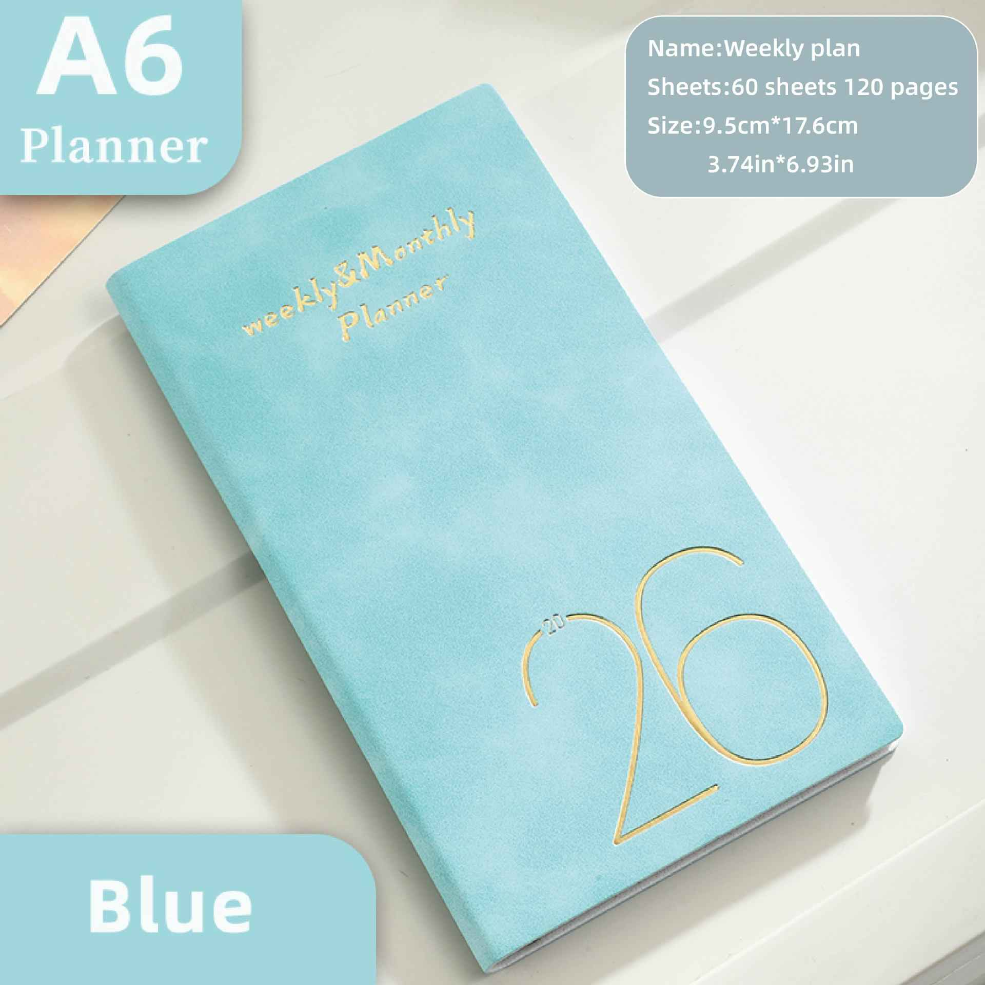 Ein blauer A6-Planer mit goldener "26"-Prägung und "weekly & Monthly Planner".