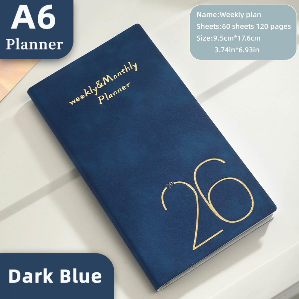 Ein dunkelblauer A6 Planer mit goldener Aufschrift 'weekly & Monthly Planner' und '26'.
