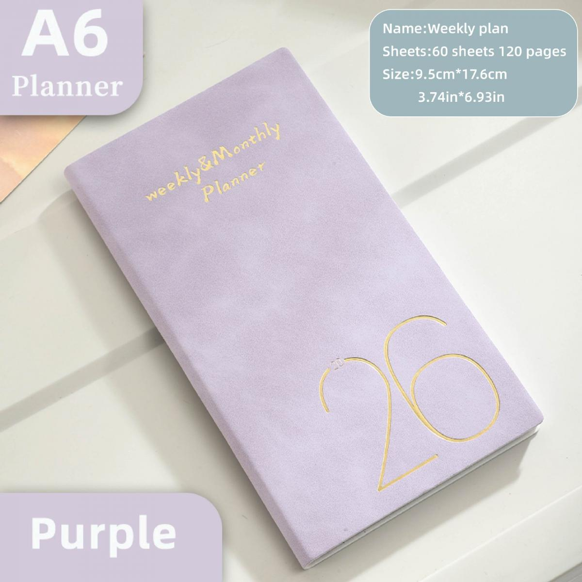 Ein lila A6-Planer mit goldener Aufschrift 'weekly&Monthly Planner' und '26'.