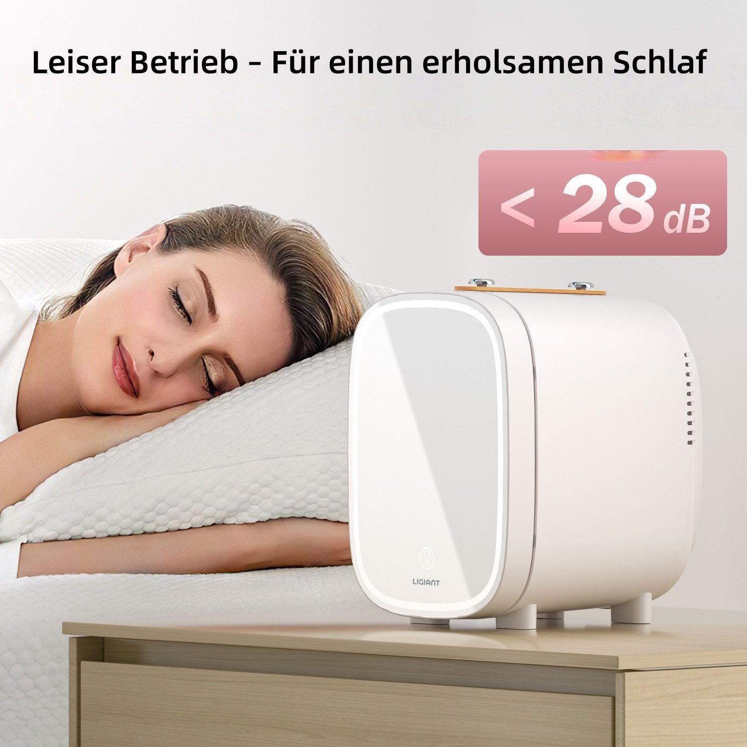 Eine Frau schläft auf einem Kissen neben einem kleinen weißen Gerät.
